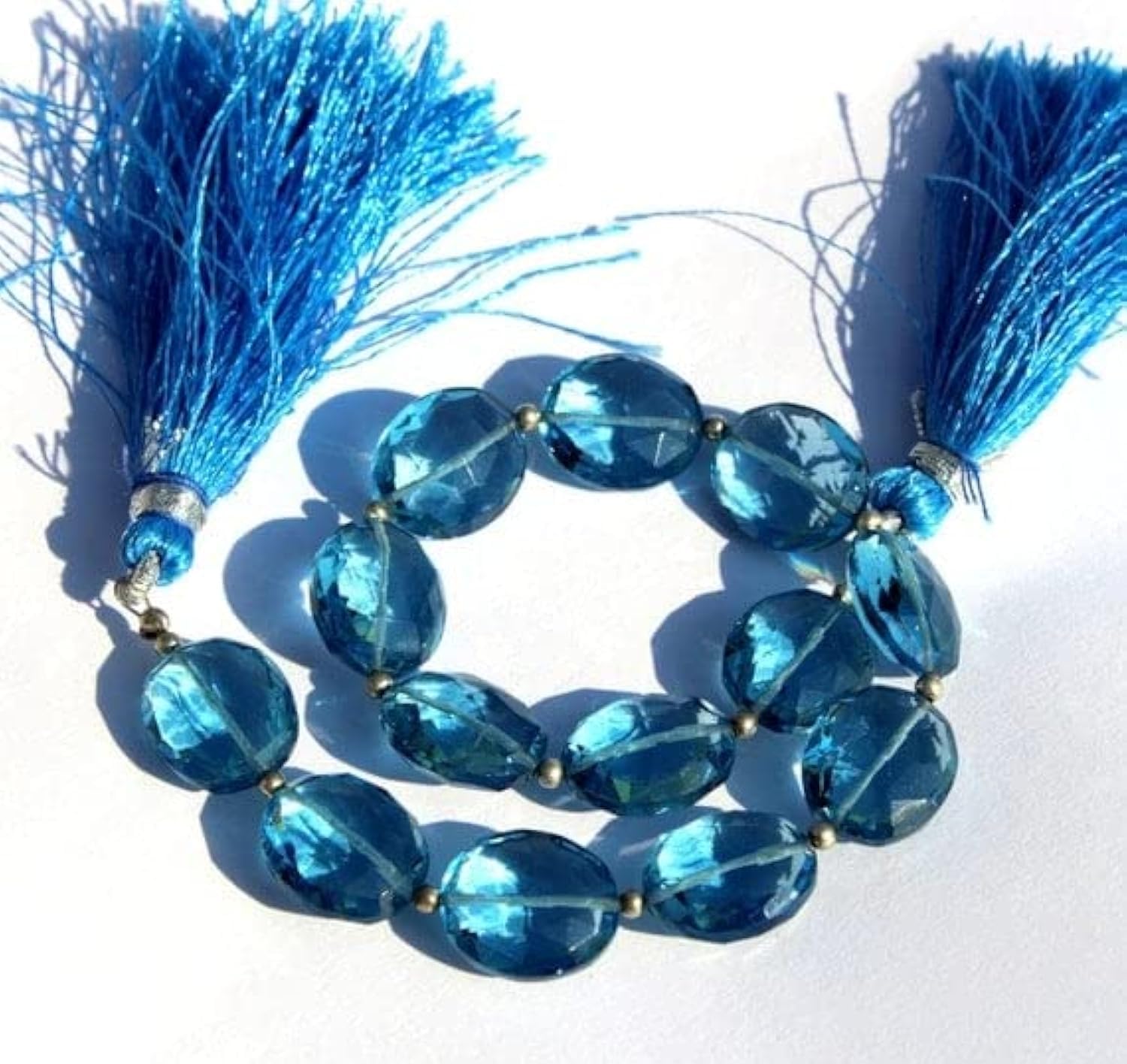 Quartz bleu de Londres briolettes d'exception en forme ovale facettée pour joaillerie haut de gamme