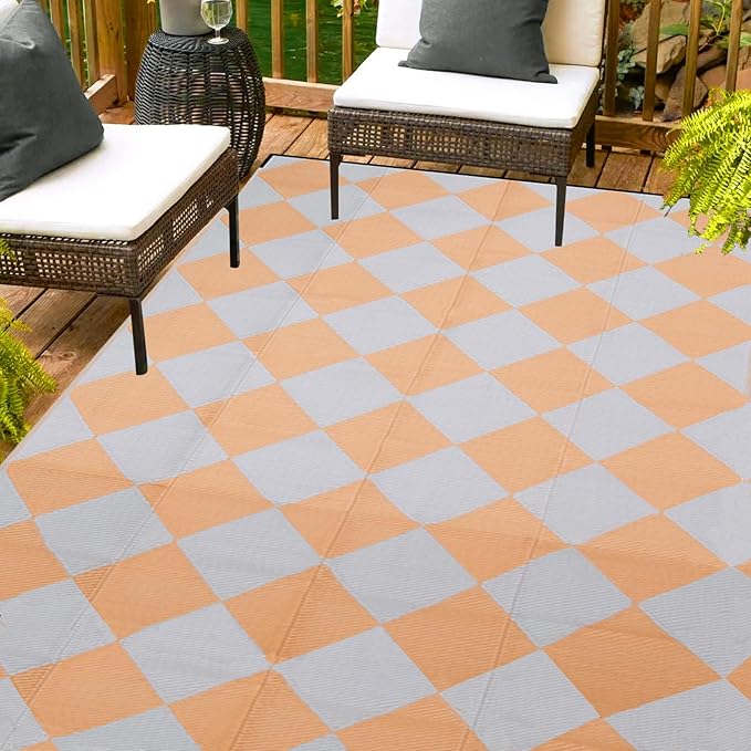 The Outdoor Rug 9x12 Waterproof is a versatile and practical option for outdoor spaces such as RVs, patios, decks, picnics, camping, and beach outings. Measuring 9x12 feet, this rug provides ample coverage for a large area, making it ideal for gathering areas or dining spaces.