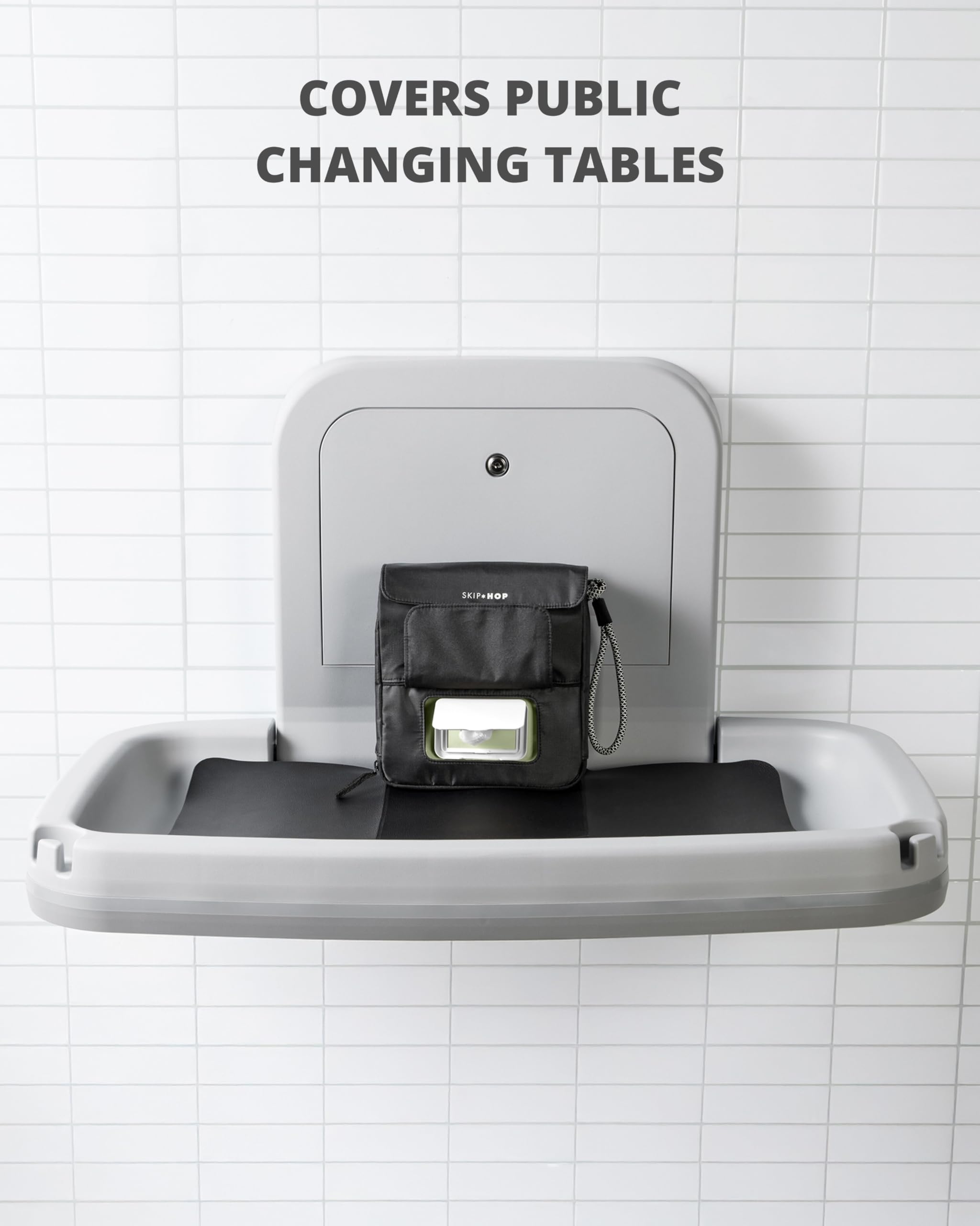 Skip Hop Cambiador de viaje para bebé con superficie fácil de limpiar, bolsillo para toallitas, almacenamiento de pañales, dispensador de bolsas desechables y bolsillo magnético para toallitas