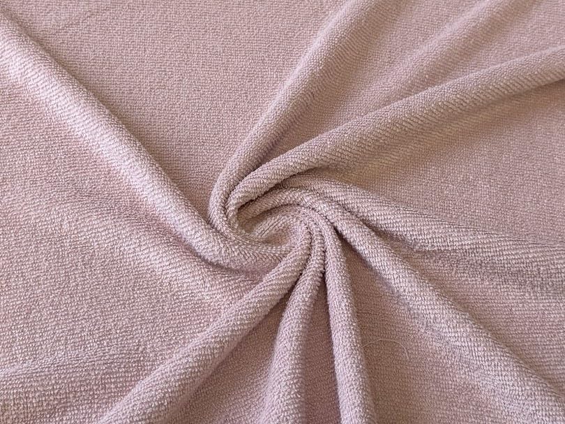 Tissu éponge extensible rose poudré pour coudre votre linge de bain