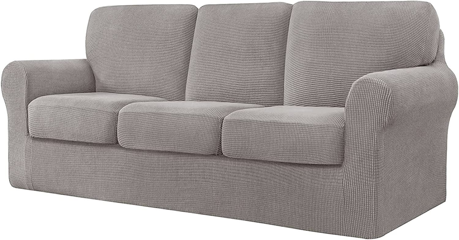 Housse de canapé extensible taupe : protégez votre salon des enfants et animaux
