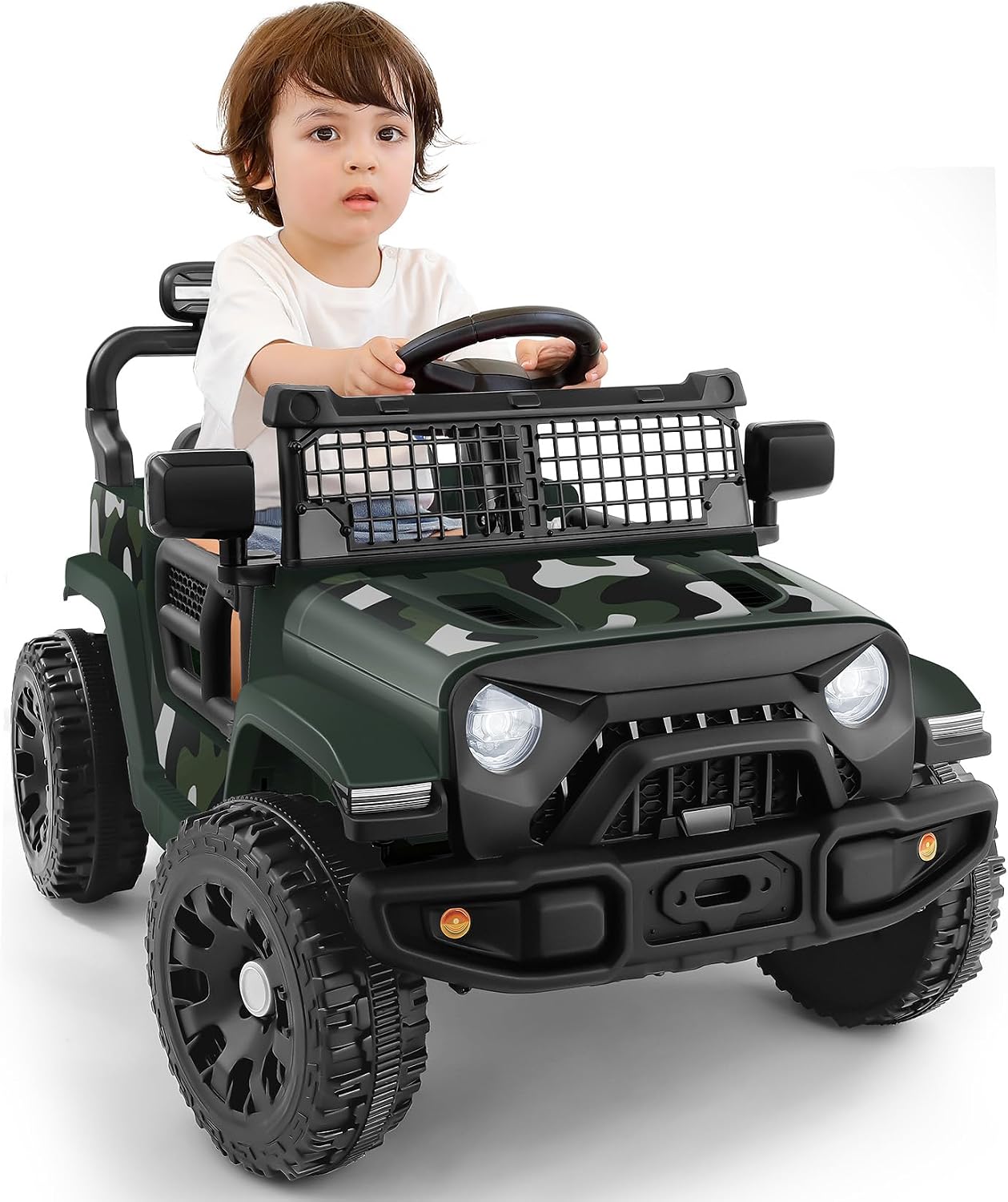 A young child sitting in the gray ELEMARA HZB-1228 Ride-On Car, which has a camouflage pattern on the sides. The car features large wheels and a front grille.