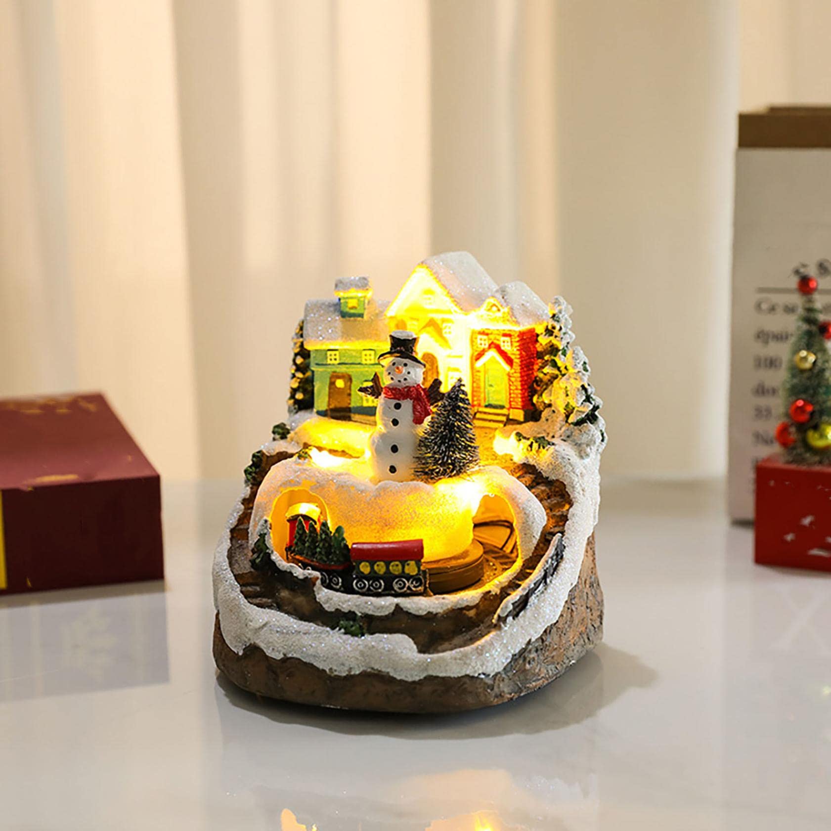 dpityserensio Christmas Village House Music Box Pre-lit Musical Winter Snow Village with Moving Xmas Train Holiday Desktop Display Decor Collectible Figurine Gift (Snowman)