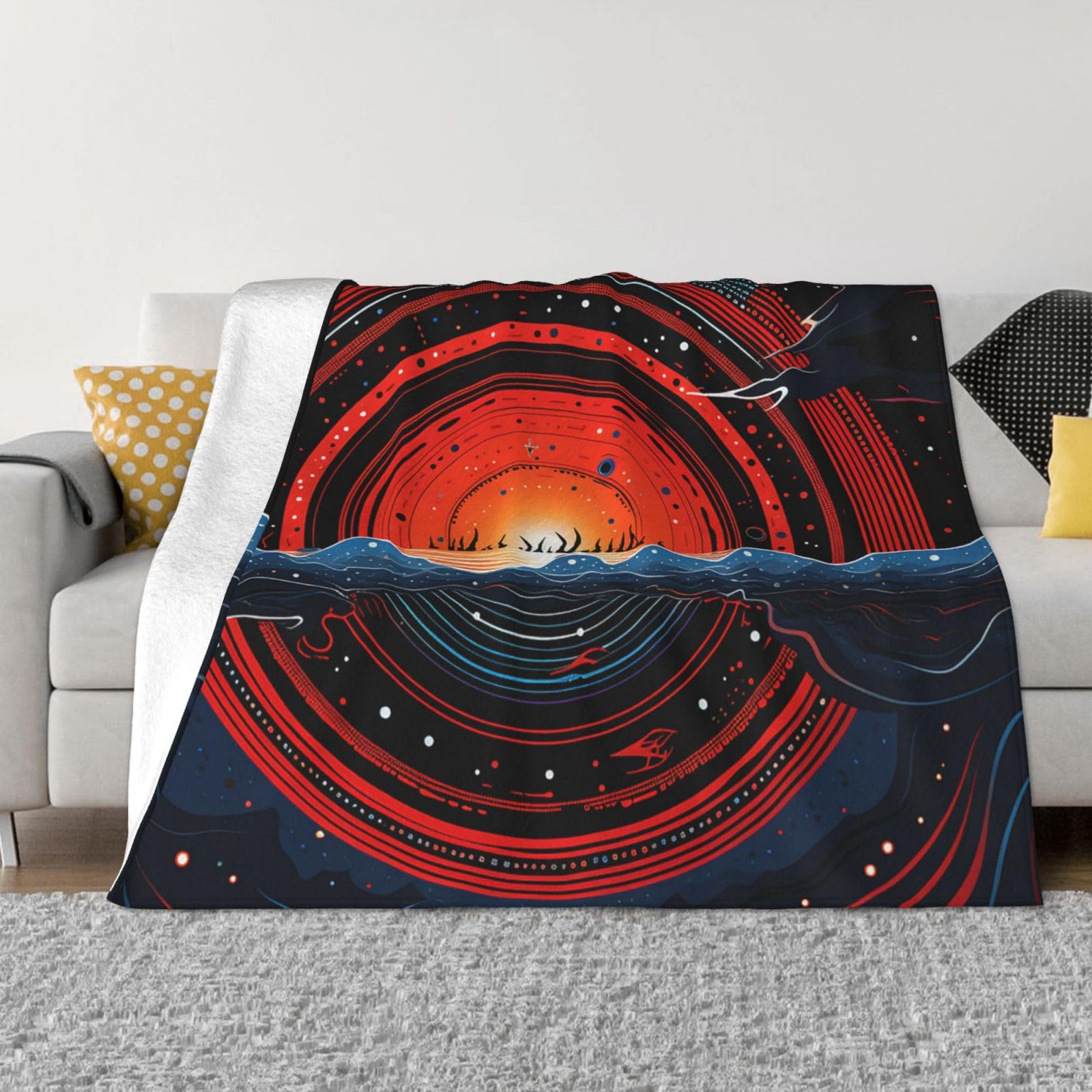 Plaid canapé motif océan Saturne doux pour vos soirées cocooning au salon