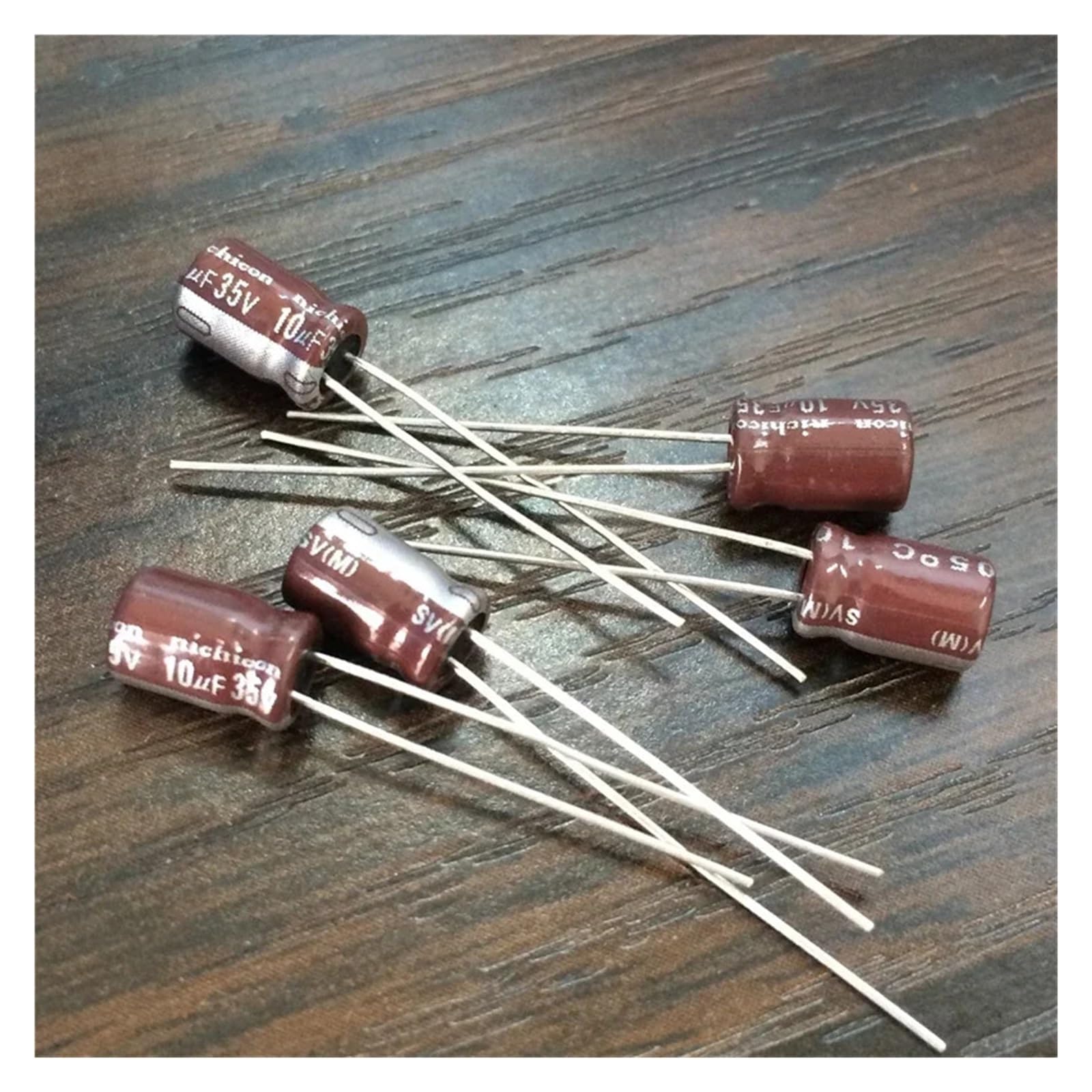 ICXLPMC 50pcs 10uF 35V 5x7mm 35V10uF Aluminum Electrolytic Capacitor