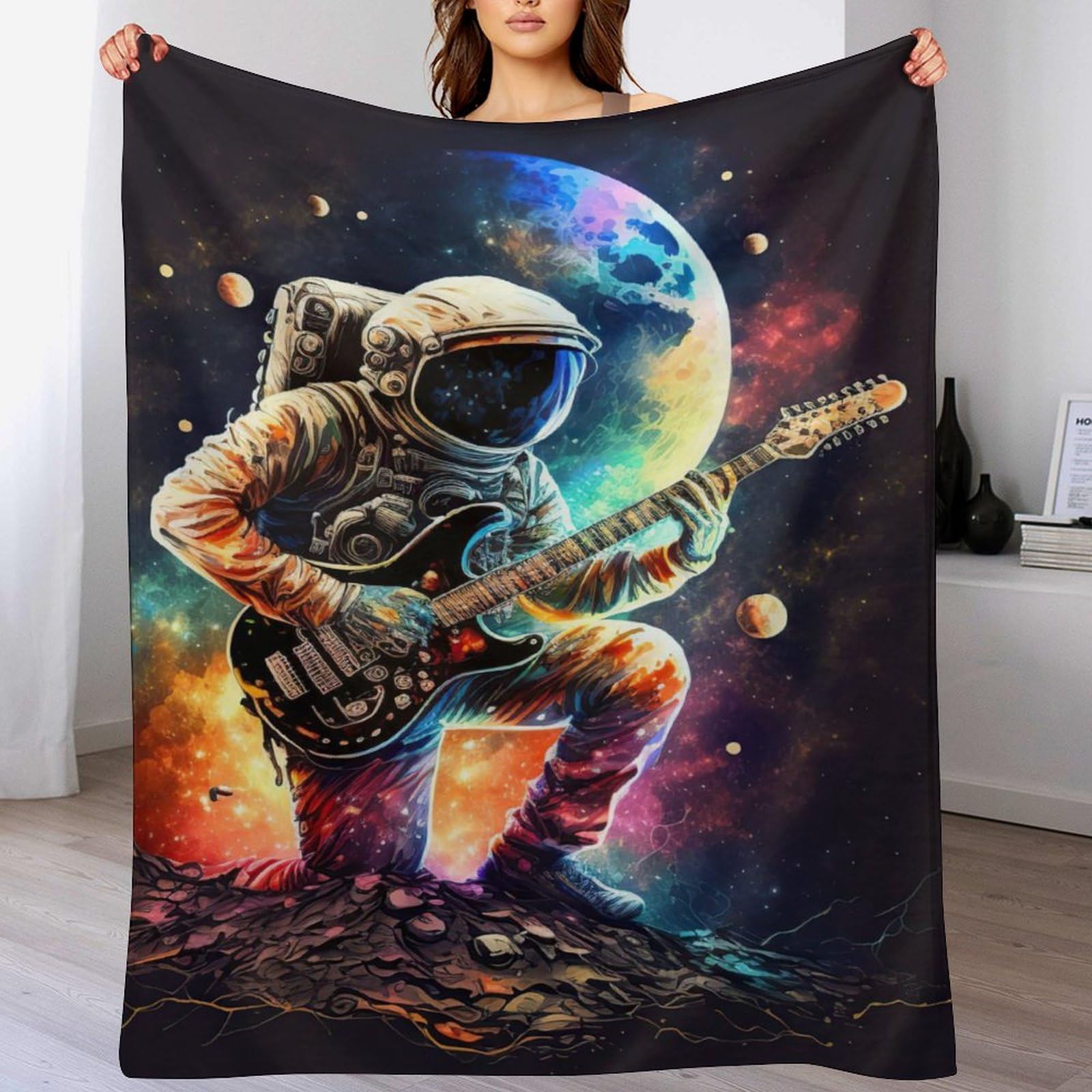 Couverture polaire astronaute idéale pour vos soirées cinéma cocooning sur le canapé