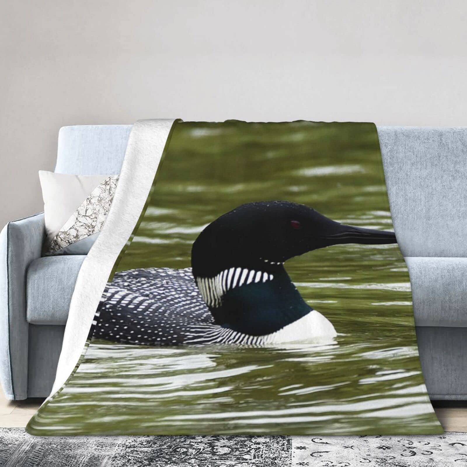 Couverture polaire Loon Nature idéale pour vos soirées cocooning au salon sur le canapé