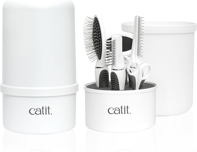 Catit Grooming Kit for Medium-Longhaired Cats. Canister includes 5 tools: Pin brush, Long dematter, metal slicker brush, grooming comb with rolling pins and curved nail clippers