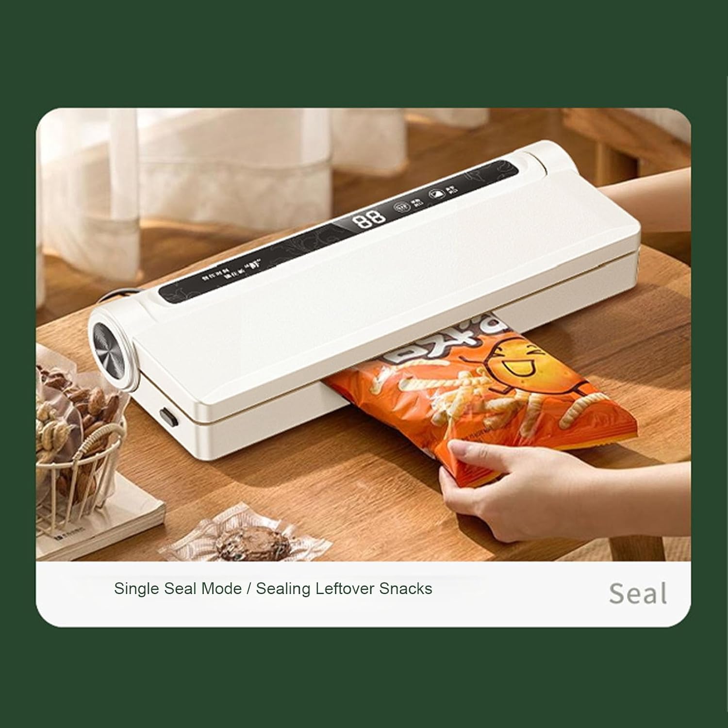 A hand pressing the 'Single Seal Mode' button on the vacuum sealer to seal a bag of snacks.
