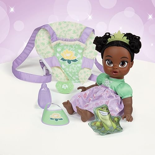 Miniatura 2 de Disney - Muñeca de la princesa Baby Tiana de lujo con tiara, portabebé, amigo de felpa, chupón, babero y biberón [Exclusivo de Amazon]