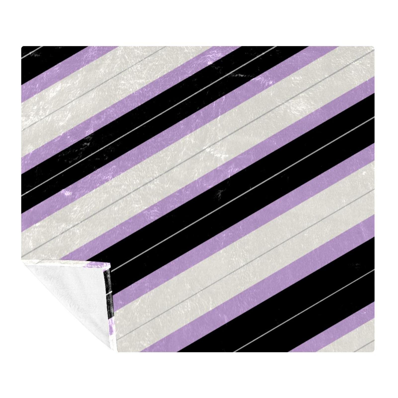 Couverture polaire noir et violette rayée pour lit et canapé de chambre