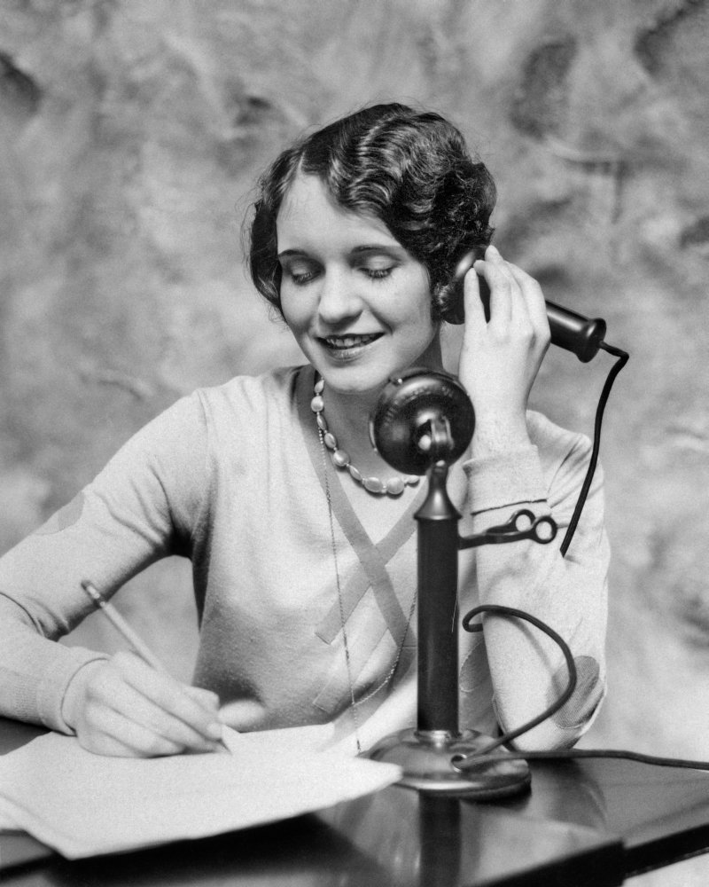 Amazon.com: 1920s Smiling Woman Sitting At Desk Writing And