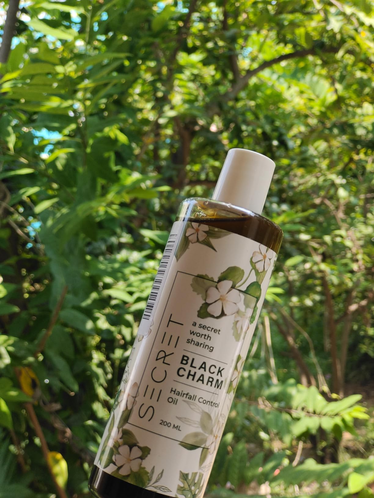 Buy Secret Black Charm hair oil 100 natural ingredients Reduces