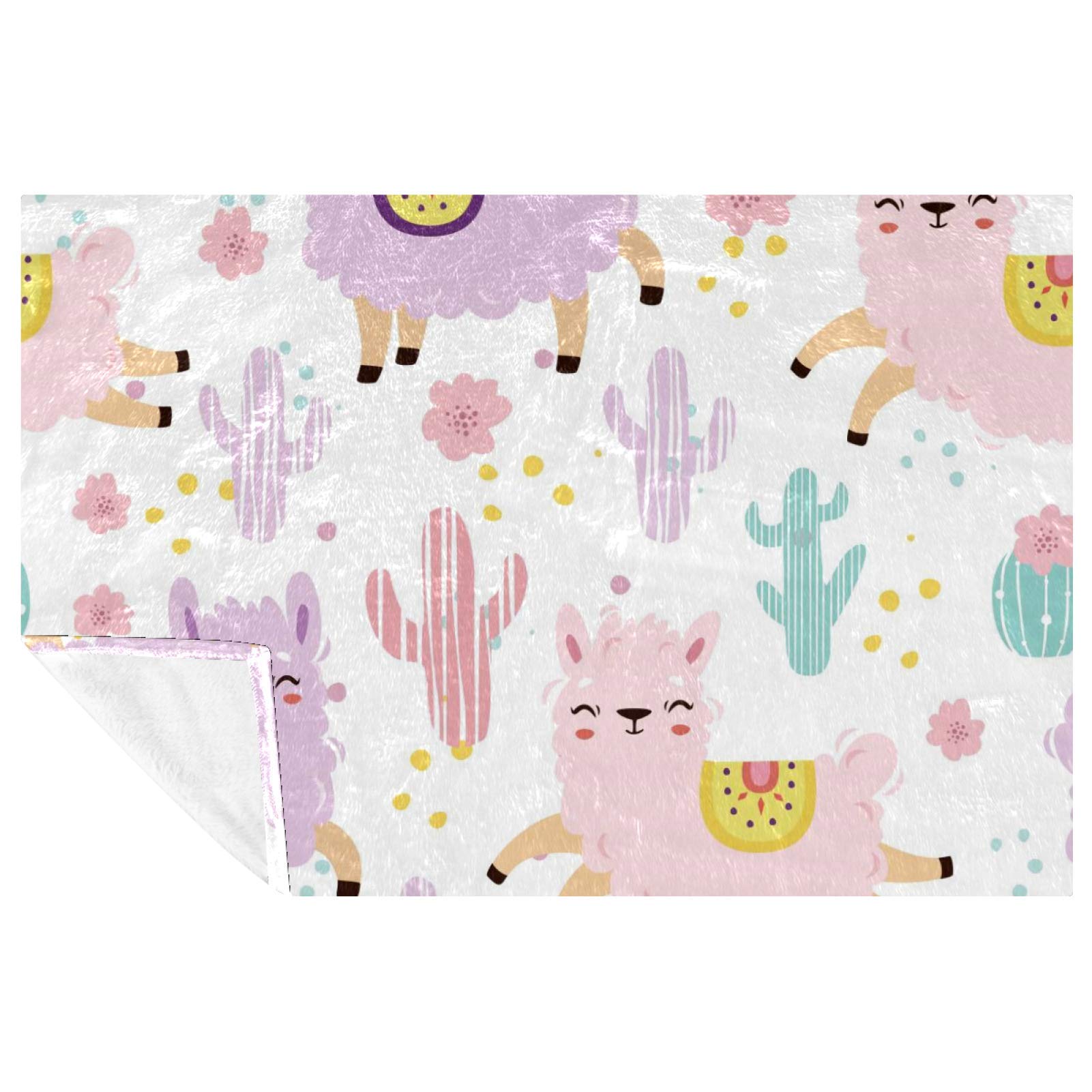 Couverture douce avec motif alpaga pour des moments chaleureux en famille