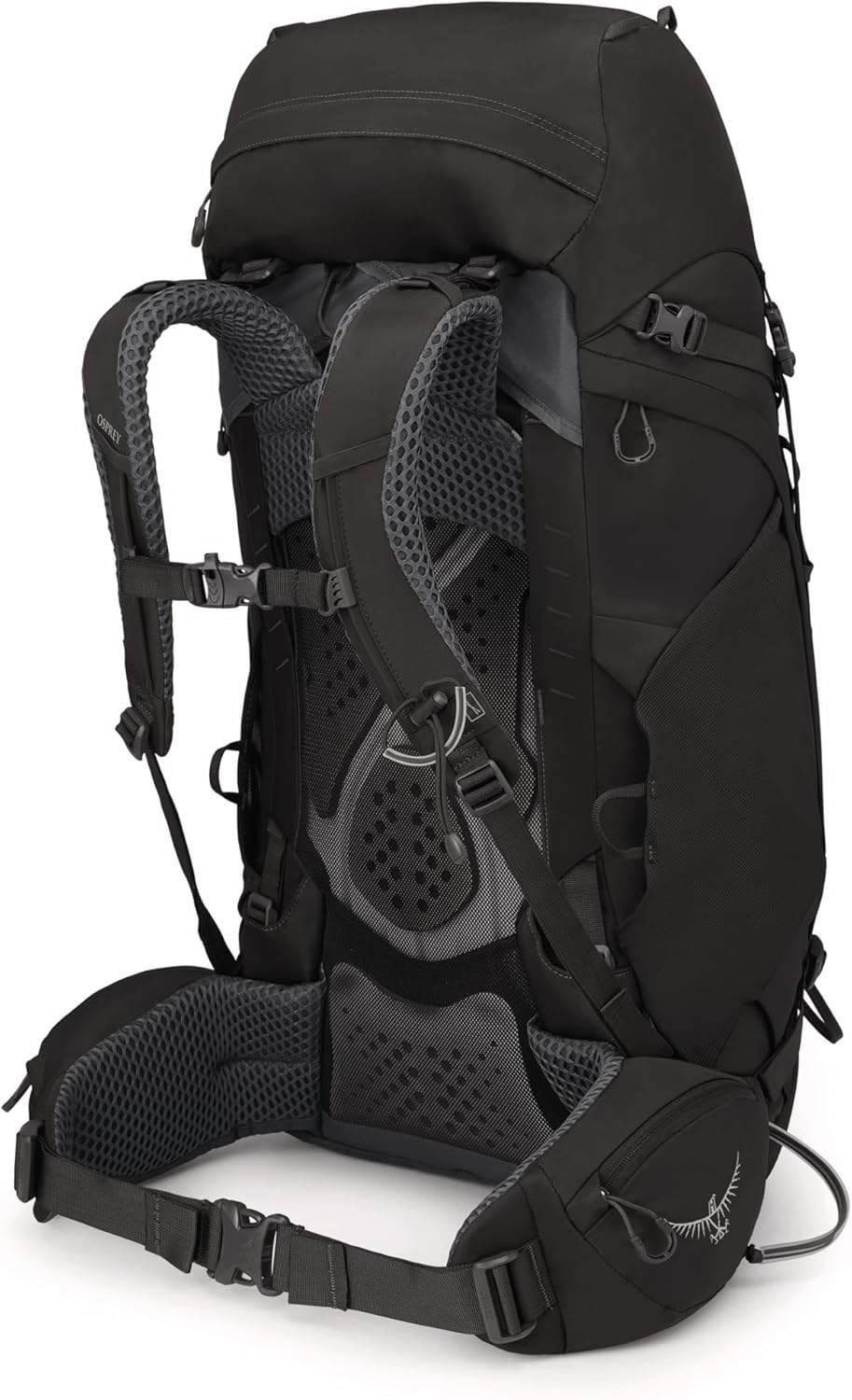 Person placing a sleeping bag into the dedicated compartment of the Osprey Kyte 48L backpack.