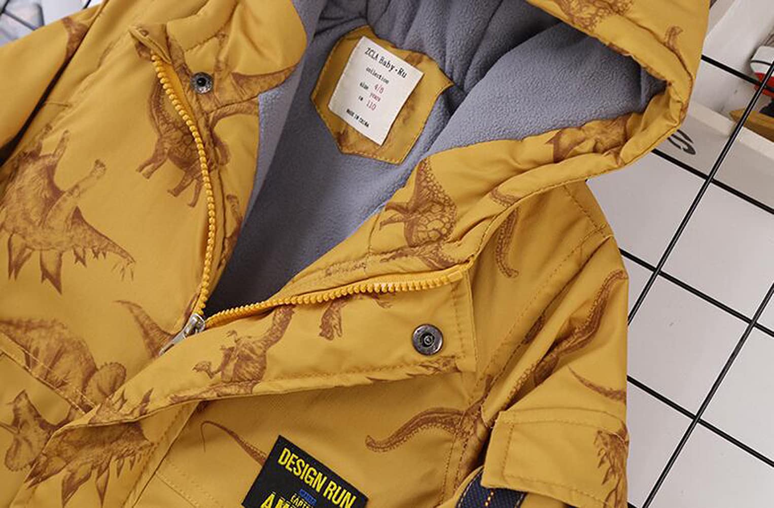 Chaqueta acolchada con capucha y estampado de dinosaurio para niños (3 a 13 años)