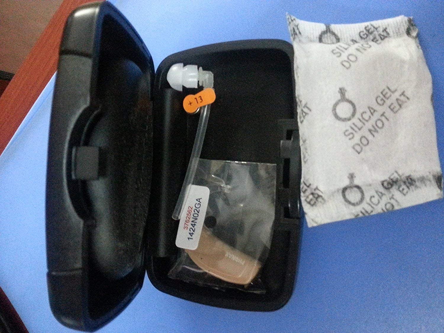 Phonak Baseo Q10-Sp Hearing Aid in case with accessories