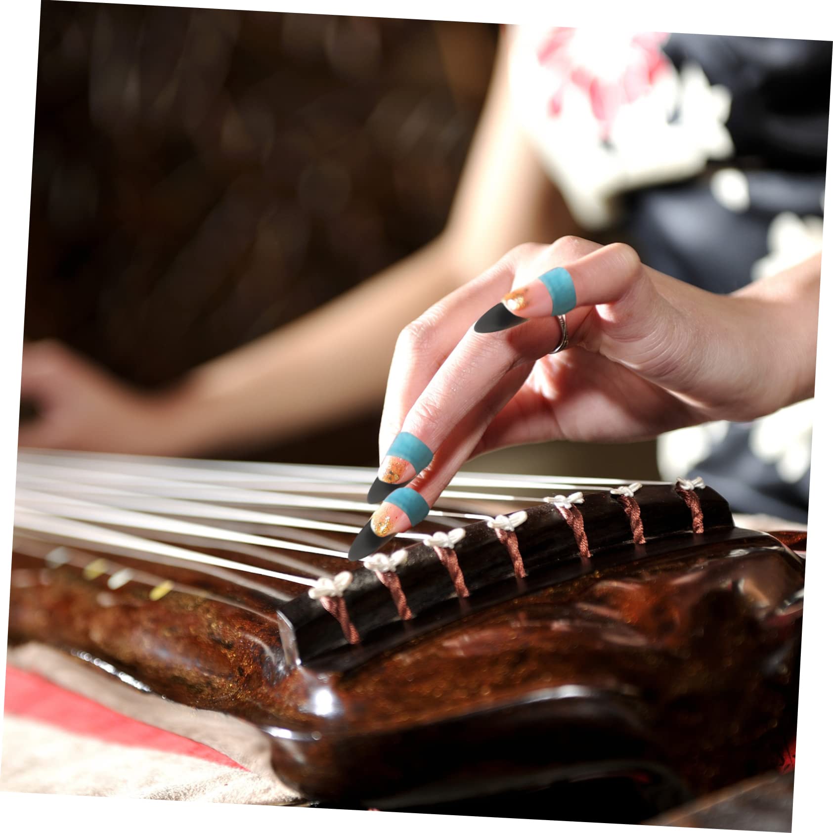 Toyvian 32stücke Guzheng -picks Natürlichem Horn Ergonomische Fingerpicks Für Professionelle Zither-spieler Für Anfänger Und Fortgeschrittene Und Leicht Zubehörteile Für