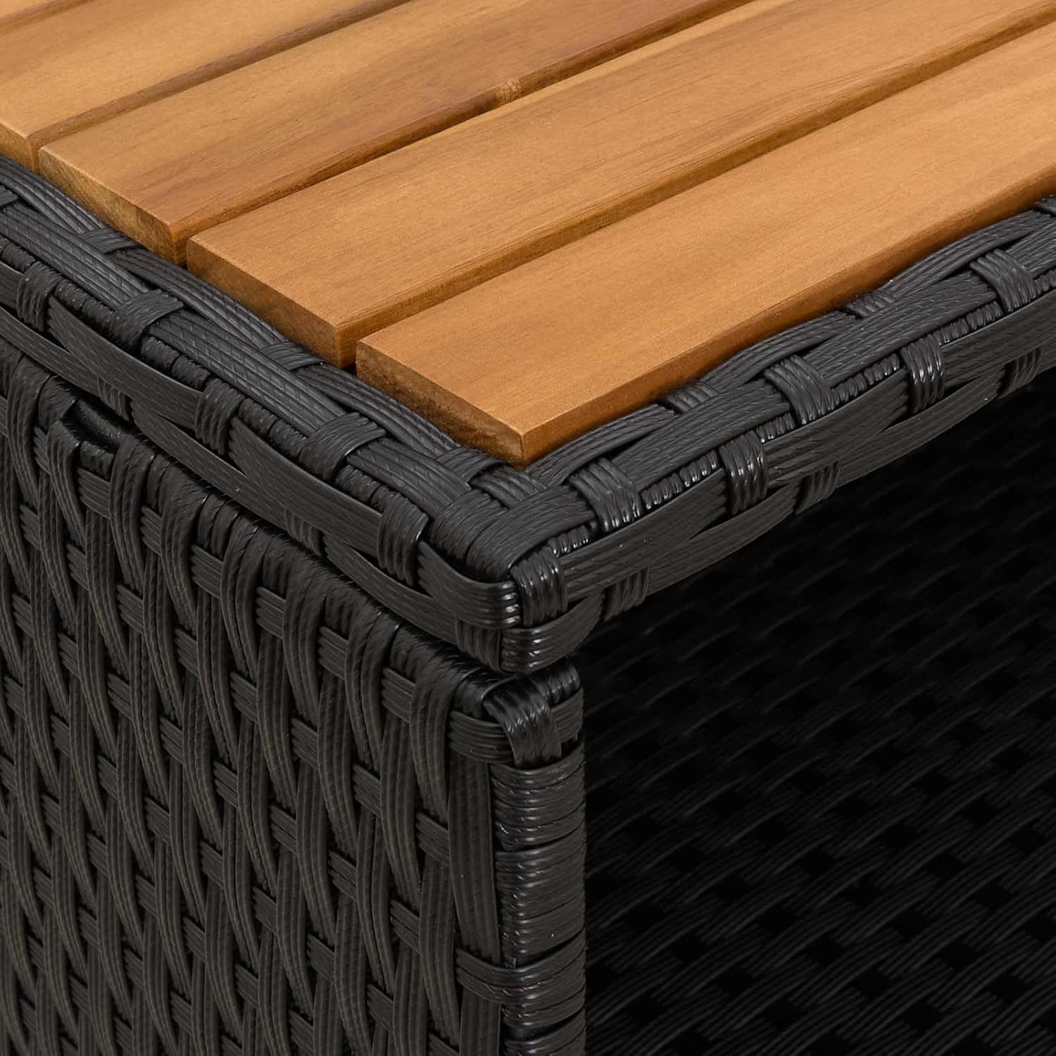 Close-up image of the acacia wood top and the woven rattan edge of the cabinet, highlighting the material combination.