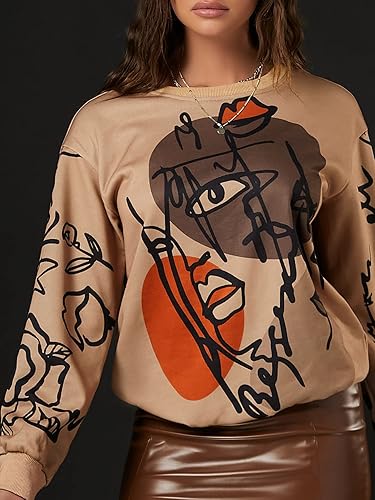 Miniatura 3 de WDIRARA Sudadera con estampado gráfico de figura para mujer, cuello redondo, manga larga, contraste de color, graffiti