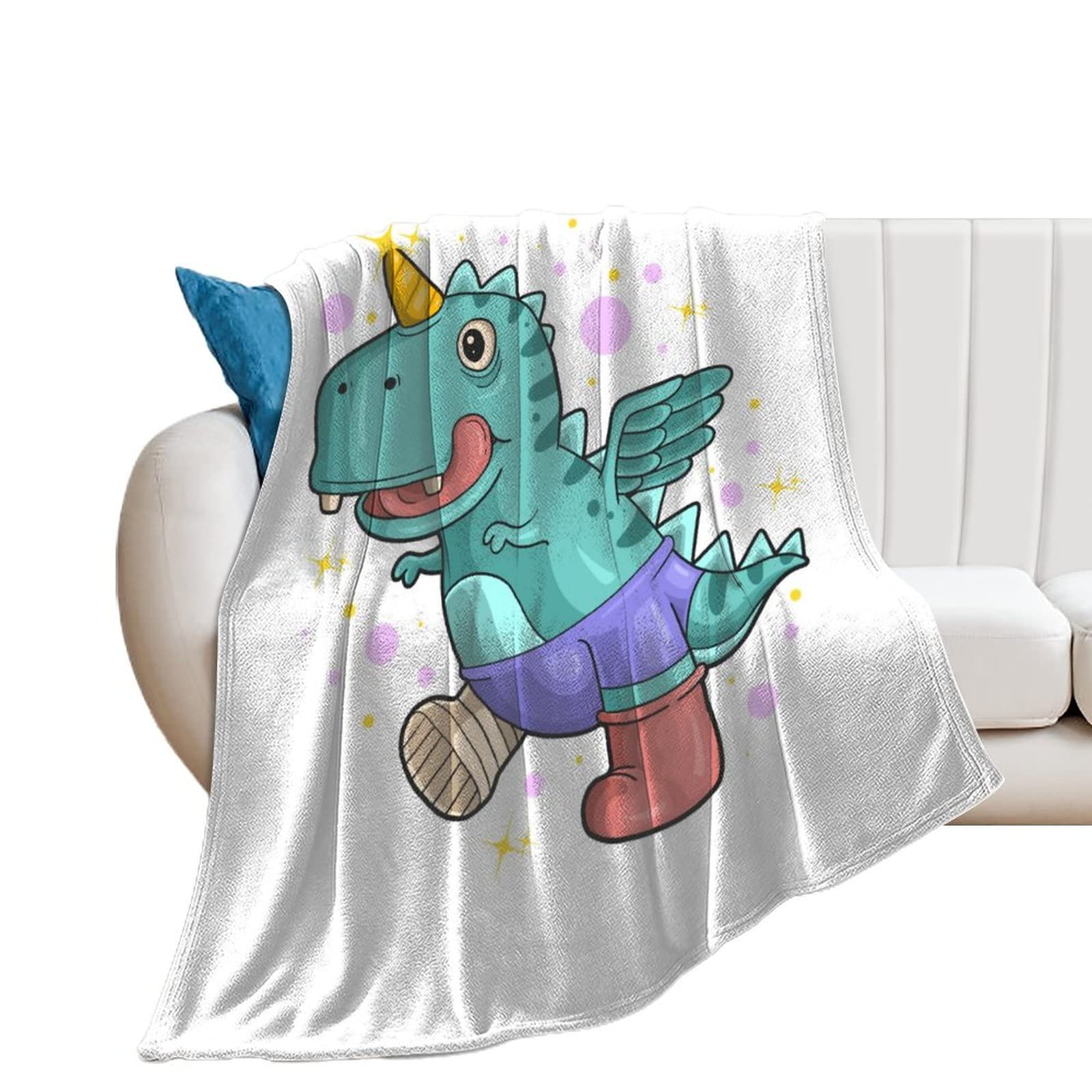 Couverture polaire douce licorne et dinosaure pour soirées cocooning sur le canapé