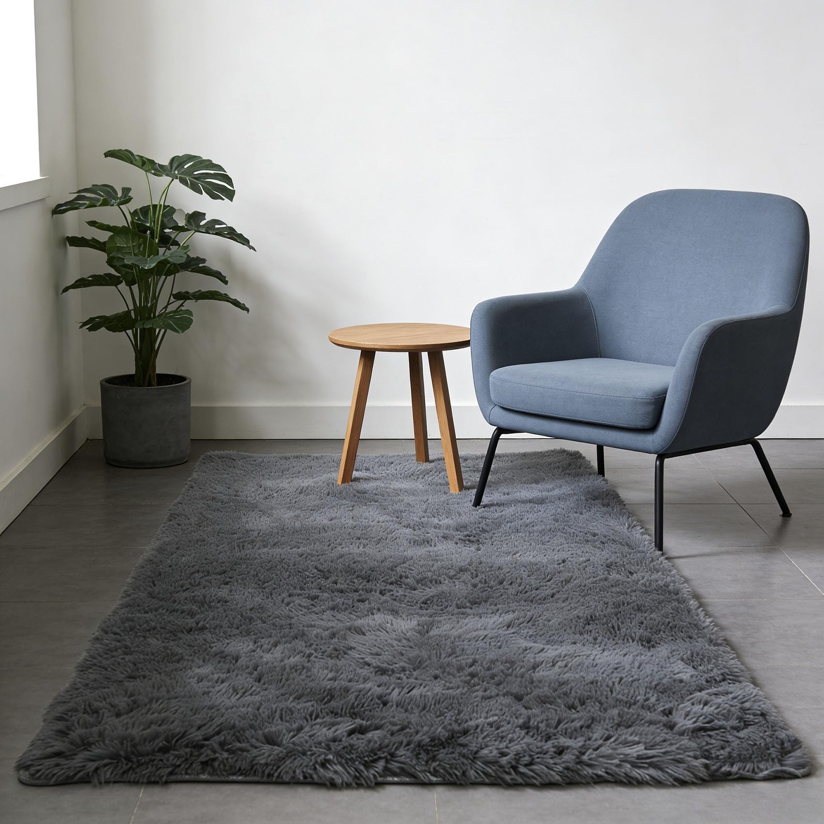 Tapis de salon doux et grand modèle idéal pour réchauffer le sol de la chambre