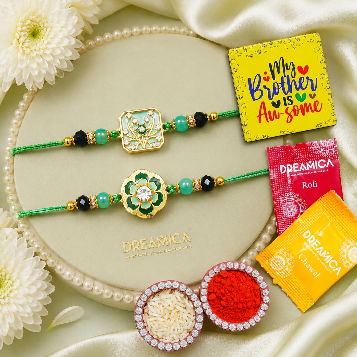 Dreamica Set of 2 Designer Rakhi for Brother | Combo with ?My Brother is Awesome? Fridge Magnet, Tilak Set (Roli-Chawal), and Greeting Card | Best Rakhi Gift for Brother (Rakhi-68)