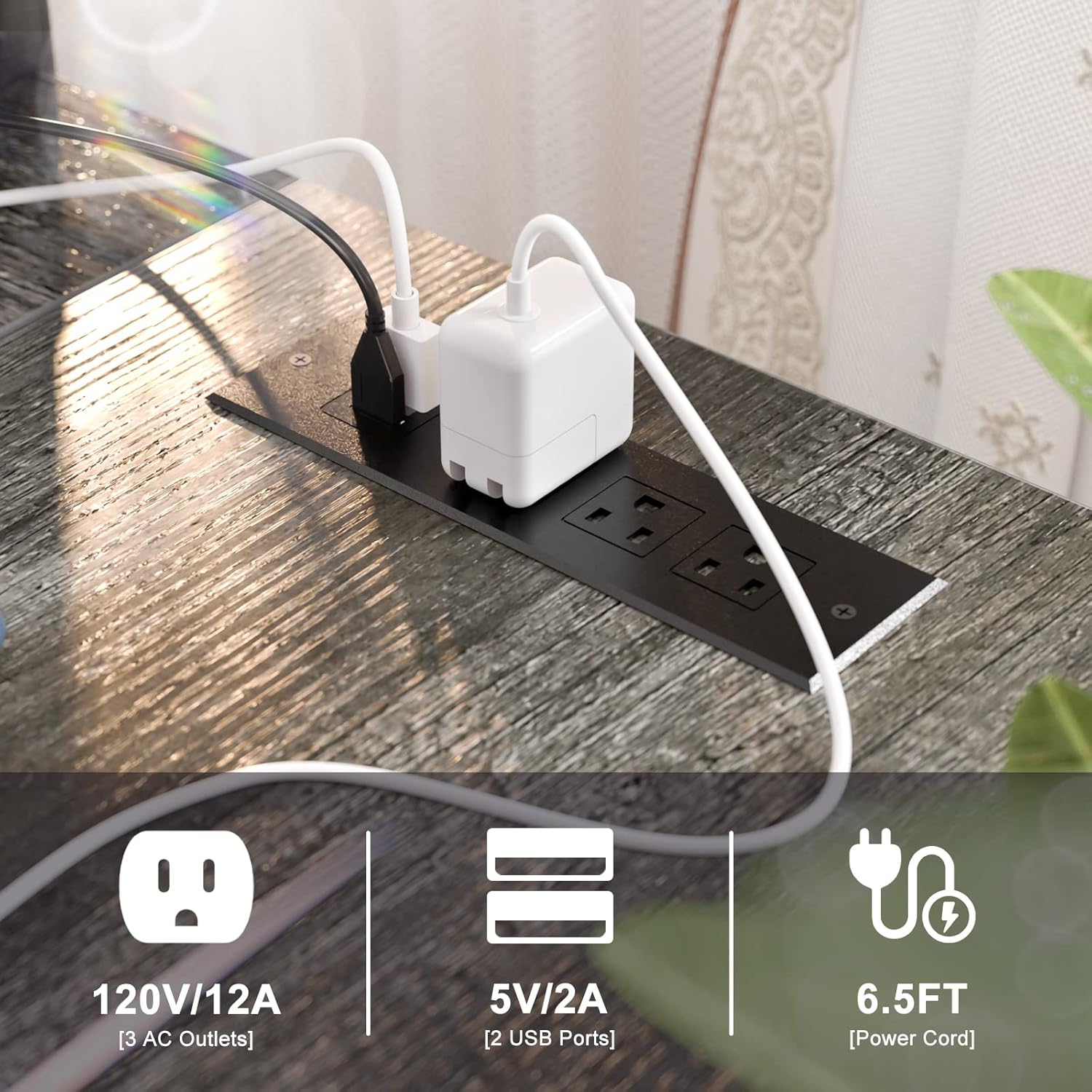 Close-up of the integrated power strip with outlets and USB ports