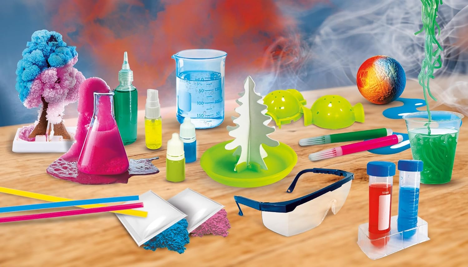 Image showing all the components of the chemistry kit laid out on a wooden table.