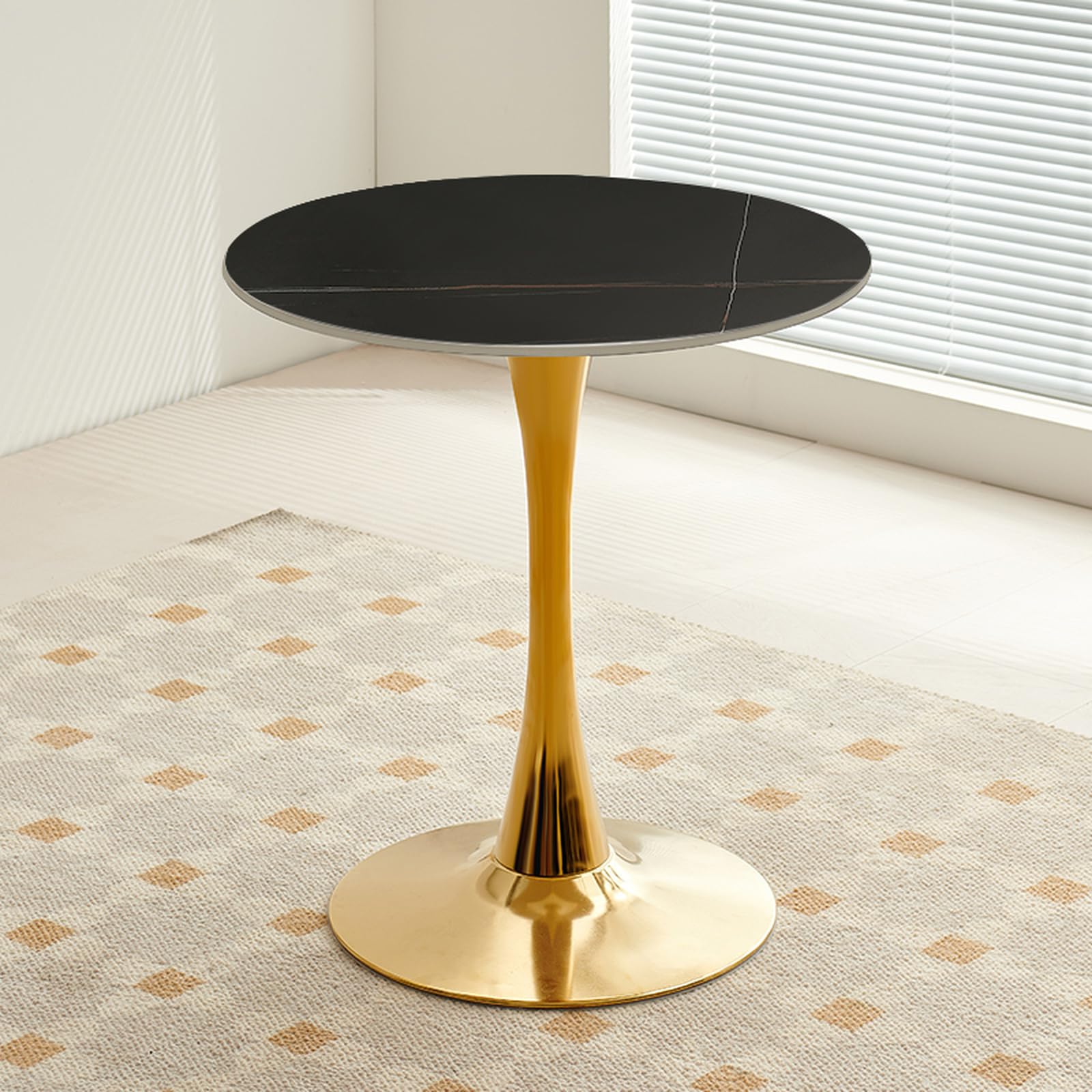 Mesa auxiliar redonda de metal con base robusta y sobre de pizarra