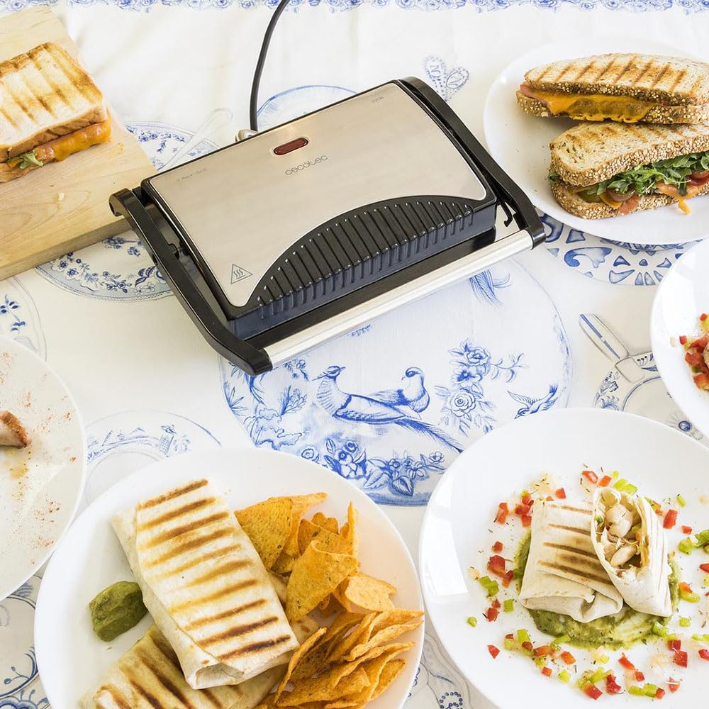Cecotec Griglia elettrica con Grill Rock'n Grill. 700 W, superficie 23 x 14,5 cm, RockStone antiaderente, senza PTFE, PFOA, piastra galleggiante, maniglia fredda al tatto, indicatore luminoso