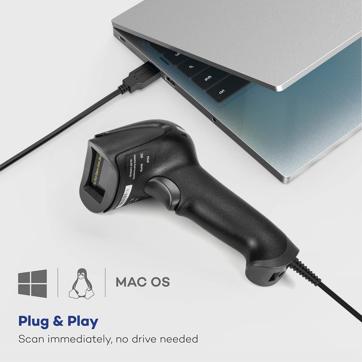 NETUM Barcode Scanner connected via USB to a laptop, demonstrating plug and play functionality.