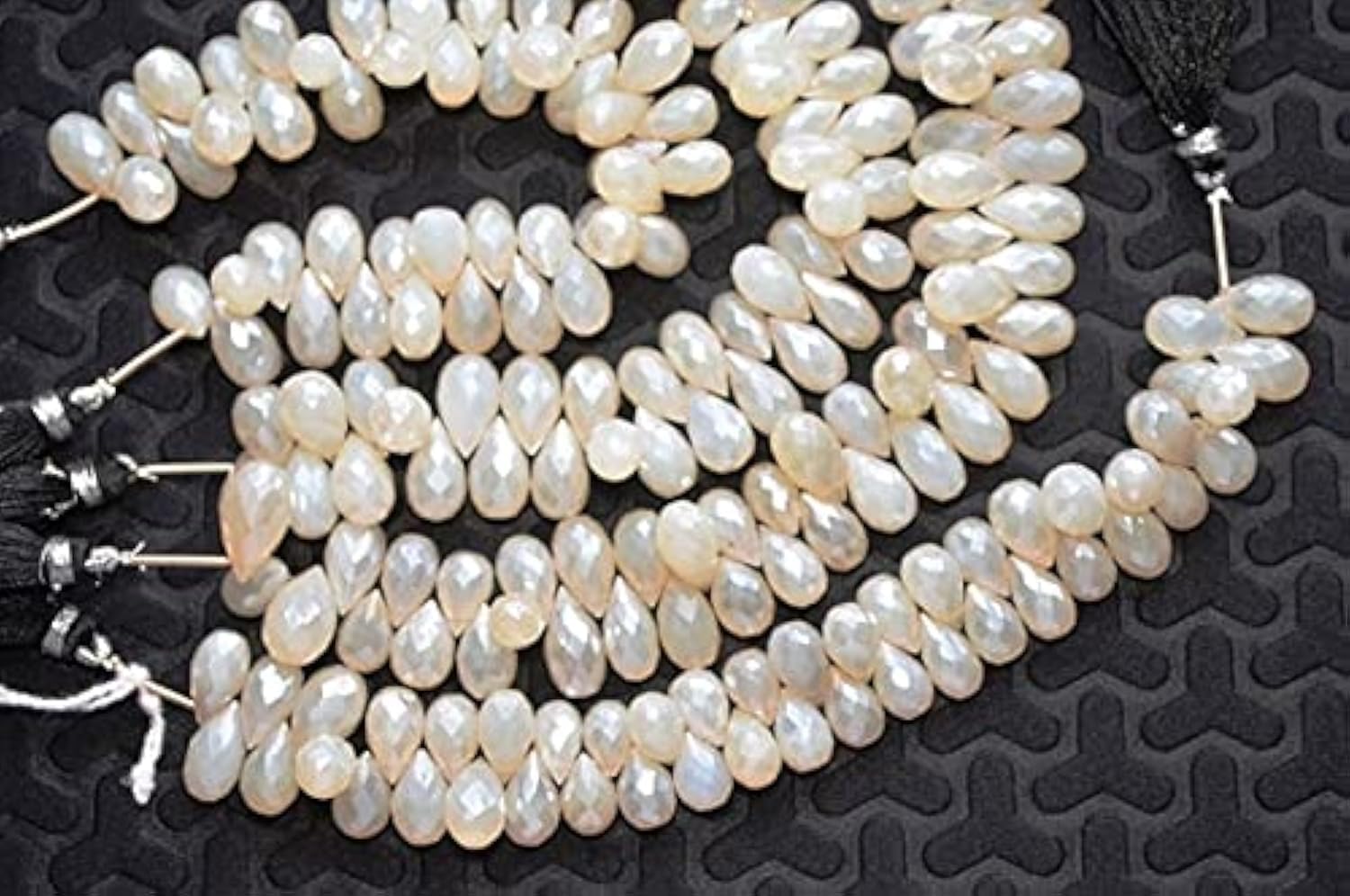 Perle calcédoine facettée en goutte 7x10-7x14mm pour création bijoux