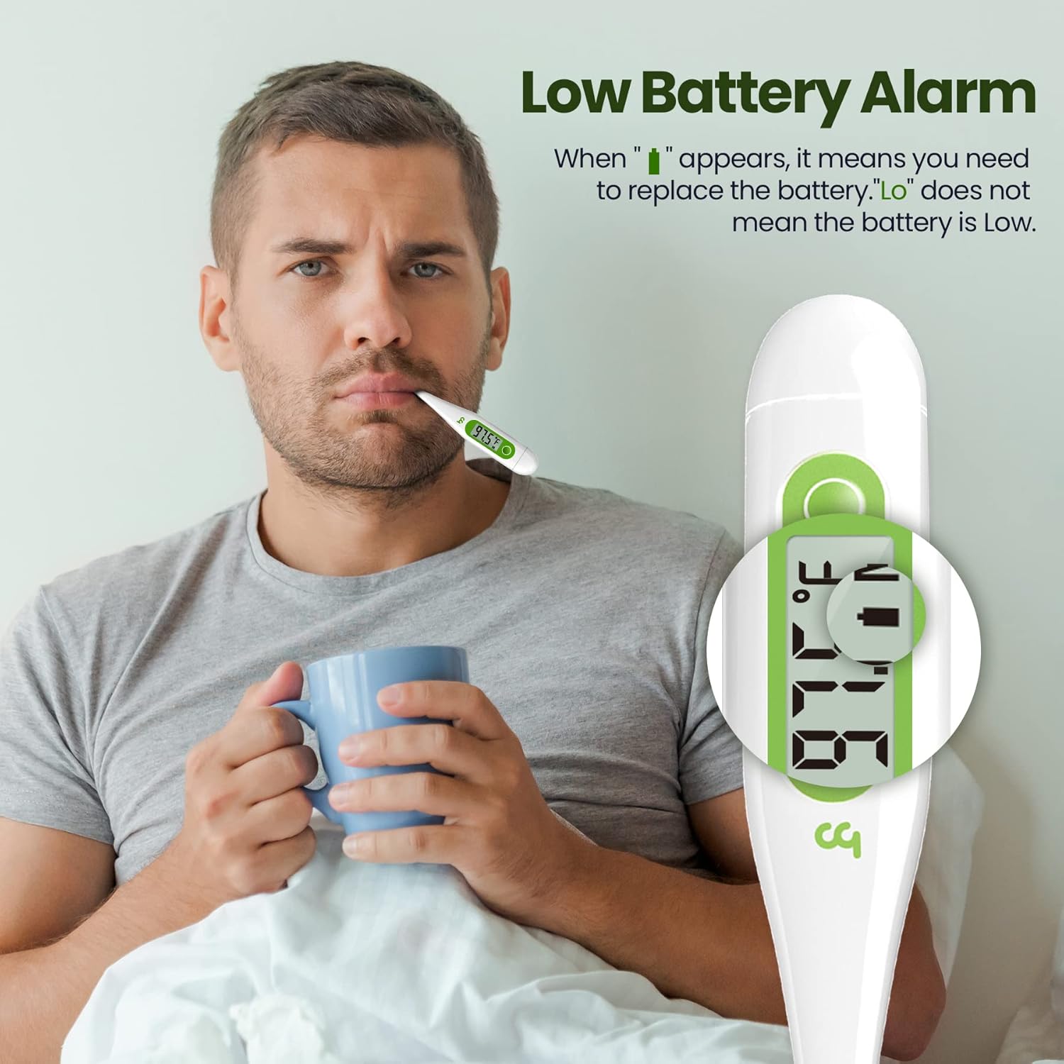 A man with a thermometer in his mouth, showing a low battery alarm on the display.