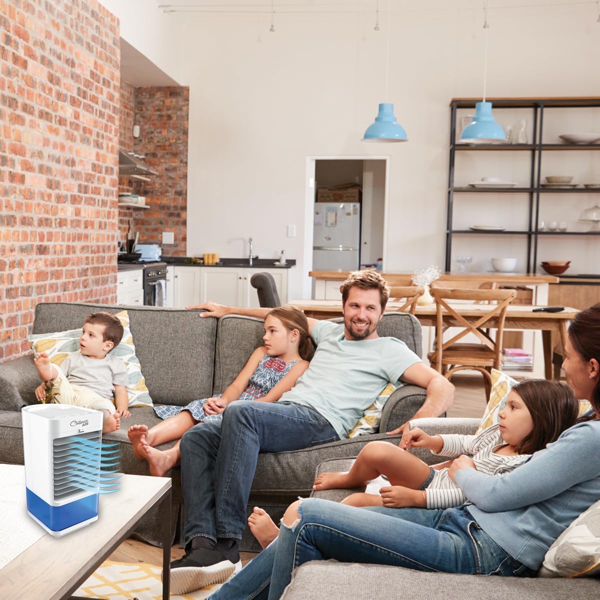 JML Chillmax Air Pure Chill XL in a living room setting with a family on a sofa