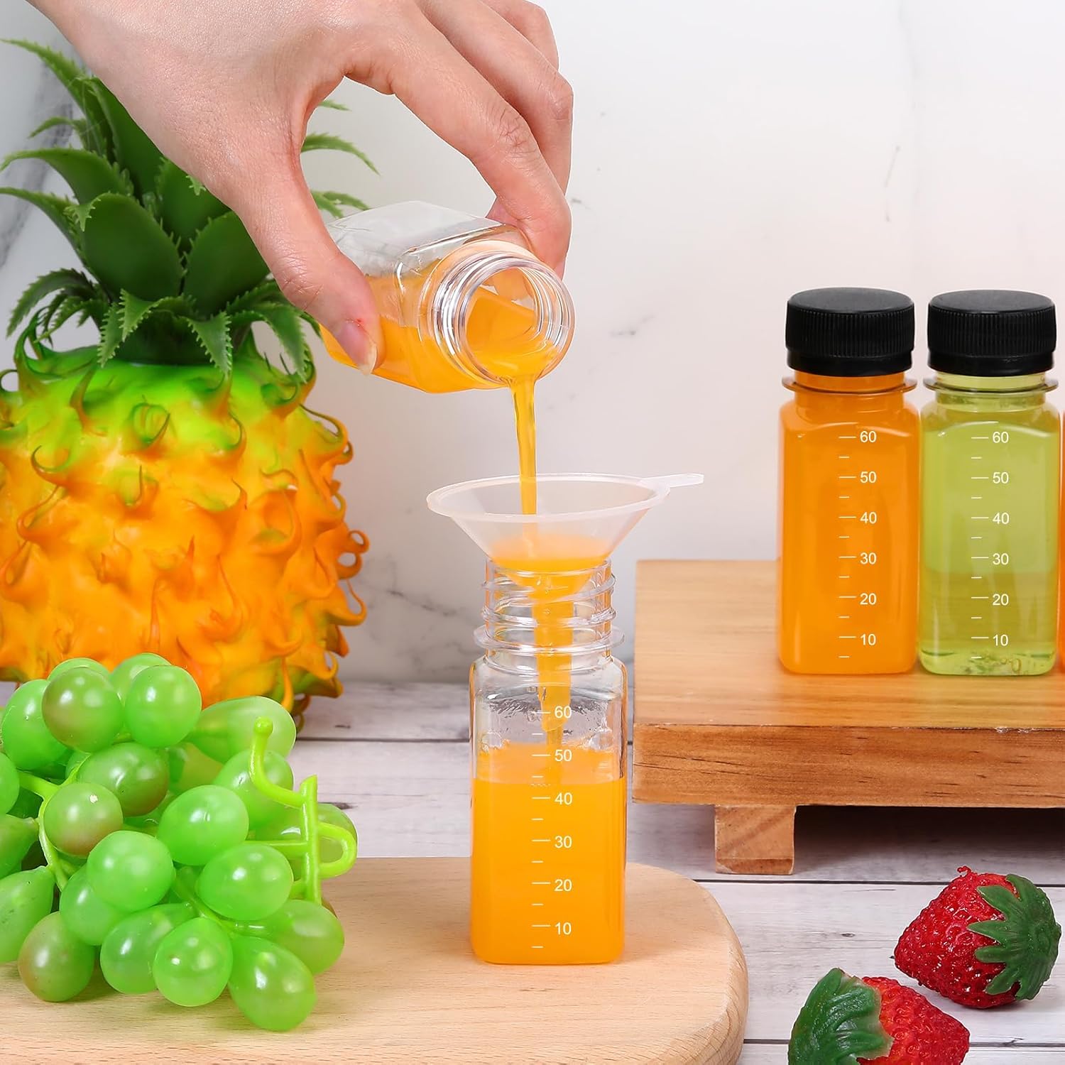 Roshtia 100 Pcs 2 oz Plastic Bottle with Caps for Liquids Small Clear Ginger Shots Bottles with Scale Reusable Mini Jars with Lids and 15 Pcs Funnel 3 Labels for Juice Sauce Bulk Portable Travel