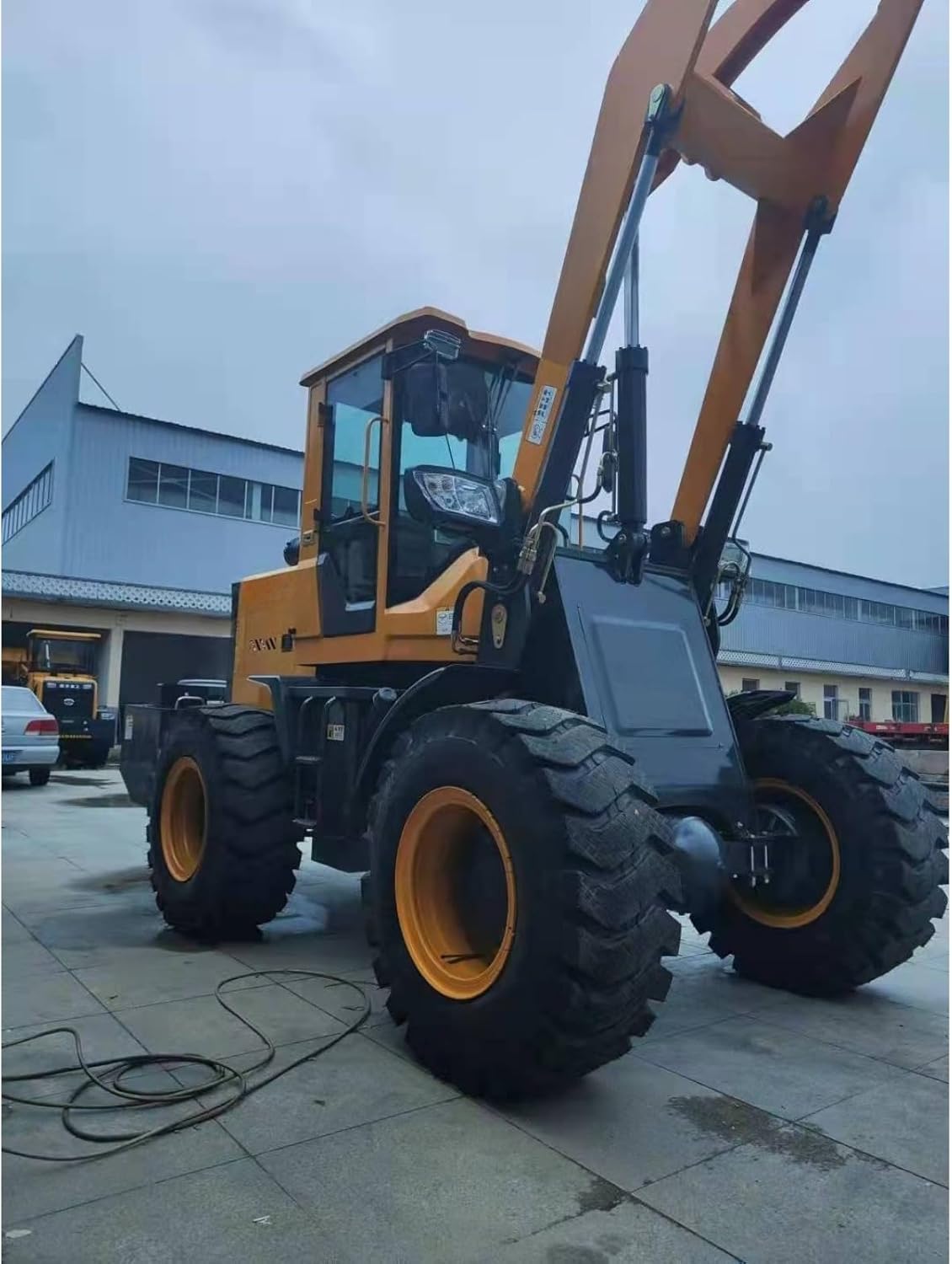 Front Wheel Loader Construction Equipment for Material Transport Job Site Operations and Landscaping Projects with Efficient Performance and Dependable Working Results for Every Task