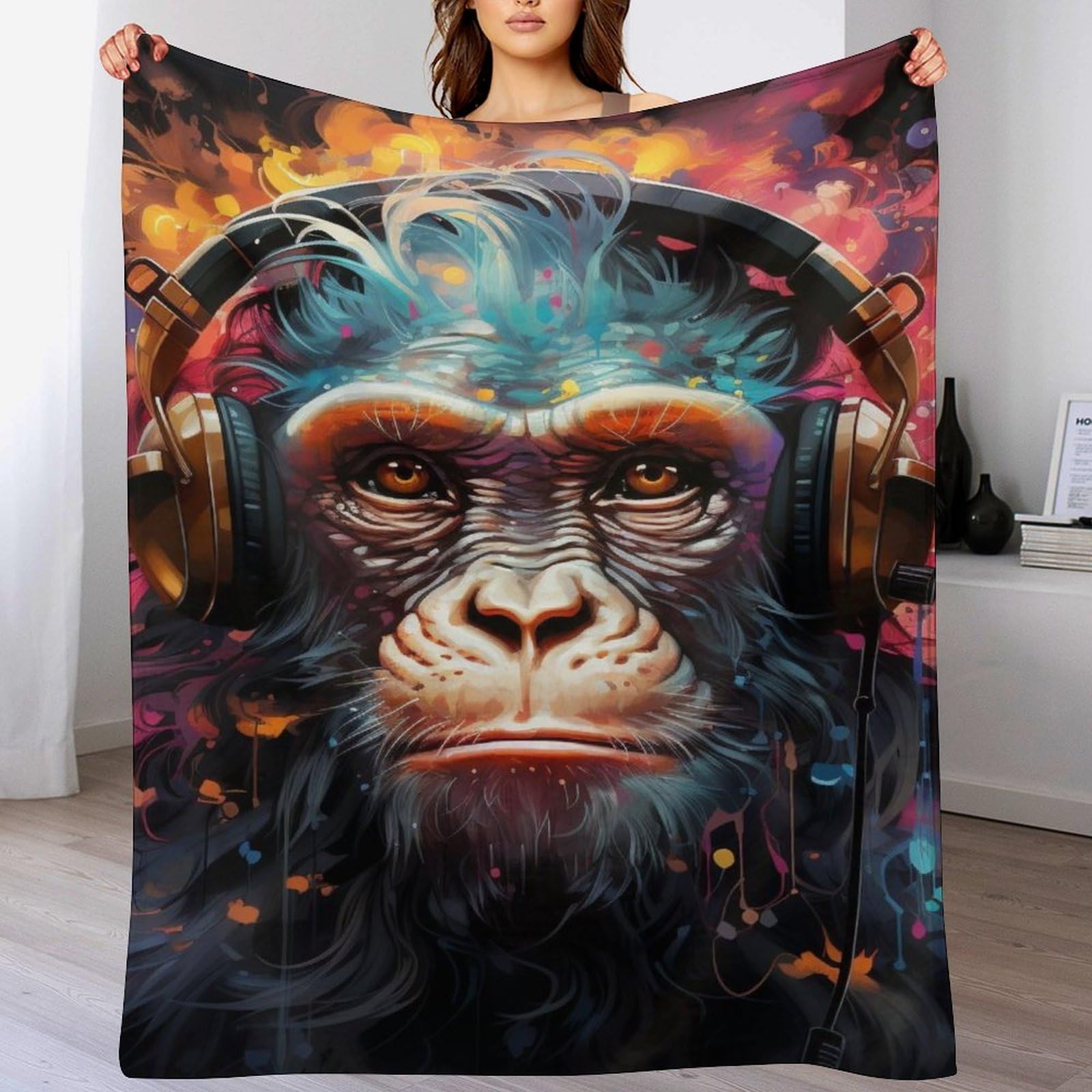 Manta de franela cómoda Gorillas de 130x150 cm para acabar con el frío en el sofá del salón