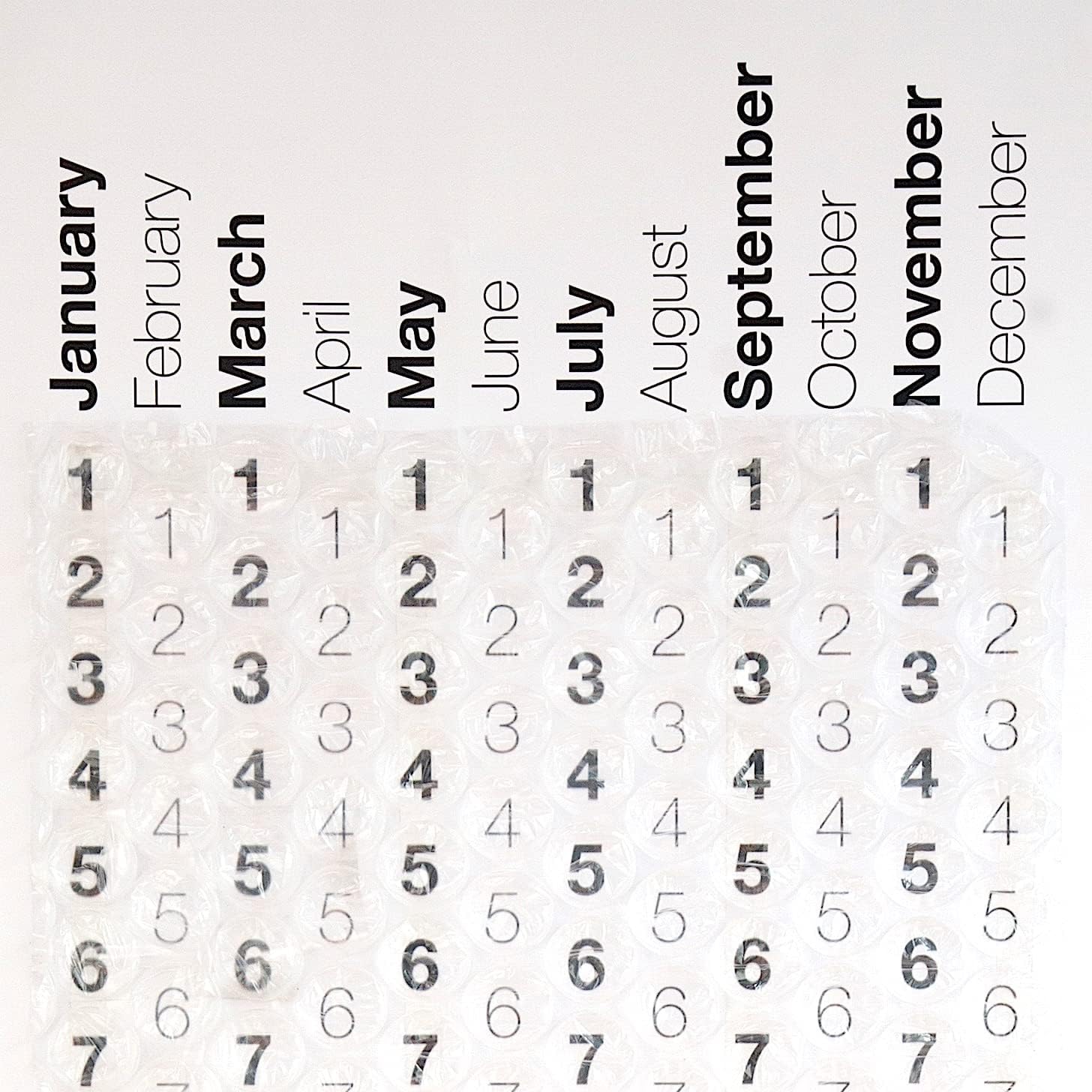 2024 Bubble Wrap Calendar - A Poster Sized Wall Calendar with a bubble to pop every day