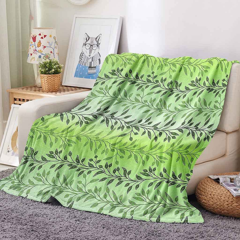 Couverture polaire arbre vert pour des soirées cocooning au chaud