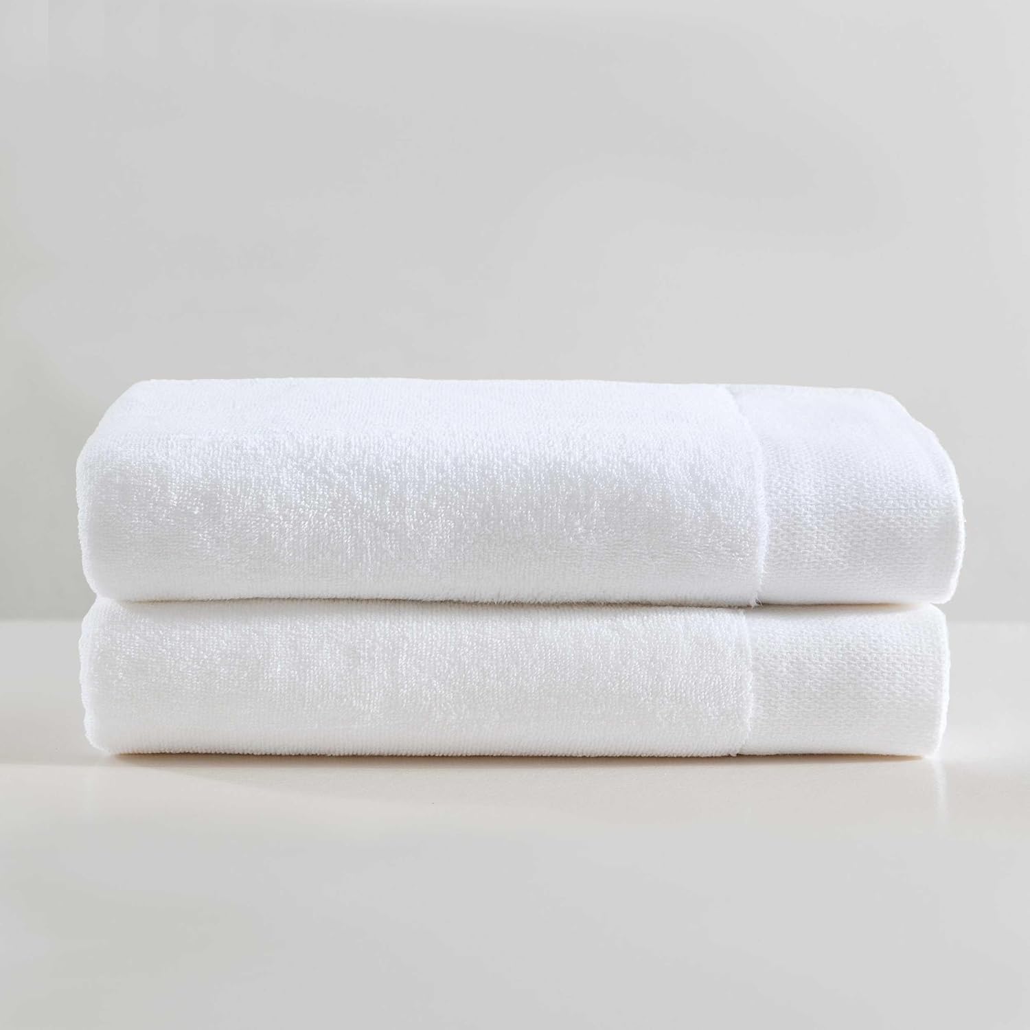 Calvin Klein - Bath Towels, Super Soft & Absorbent Cotton Towels, Zero Twist Construction, Brand Locker Loop for Easy Hanging (Entwine Solid White, 2 Piece)