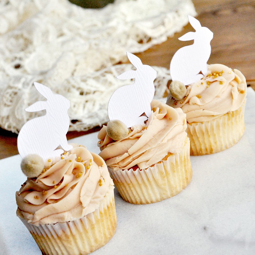Peter Rabbit Cupcake Toppers 12CT. White Woodgrain Bunny Picks with Beige Pom Poms. Bunny Cupcake Toppers.