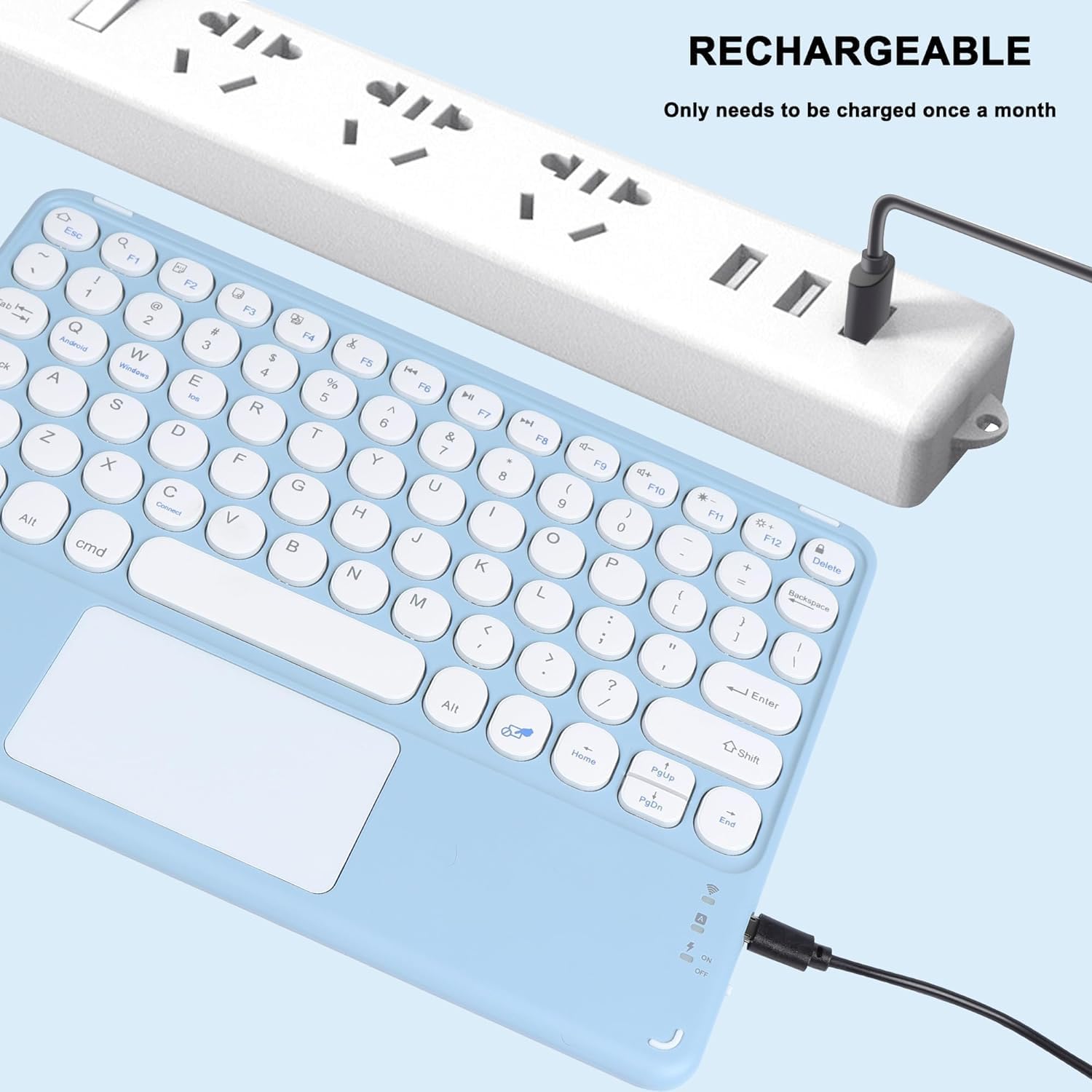 KUYHRF Wireless Keyboard connected to a power strip for charging