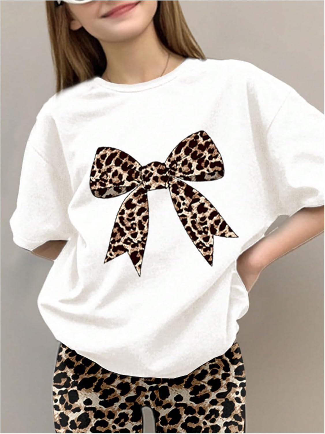 WDIRARA Girl's Leopard Print 2 Piece Outfits Bow Short Sleeve Tee Flared Pants Set - Image 3
