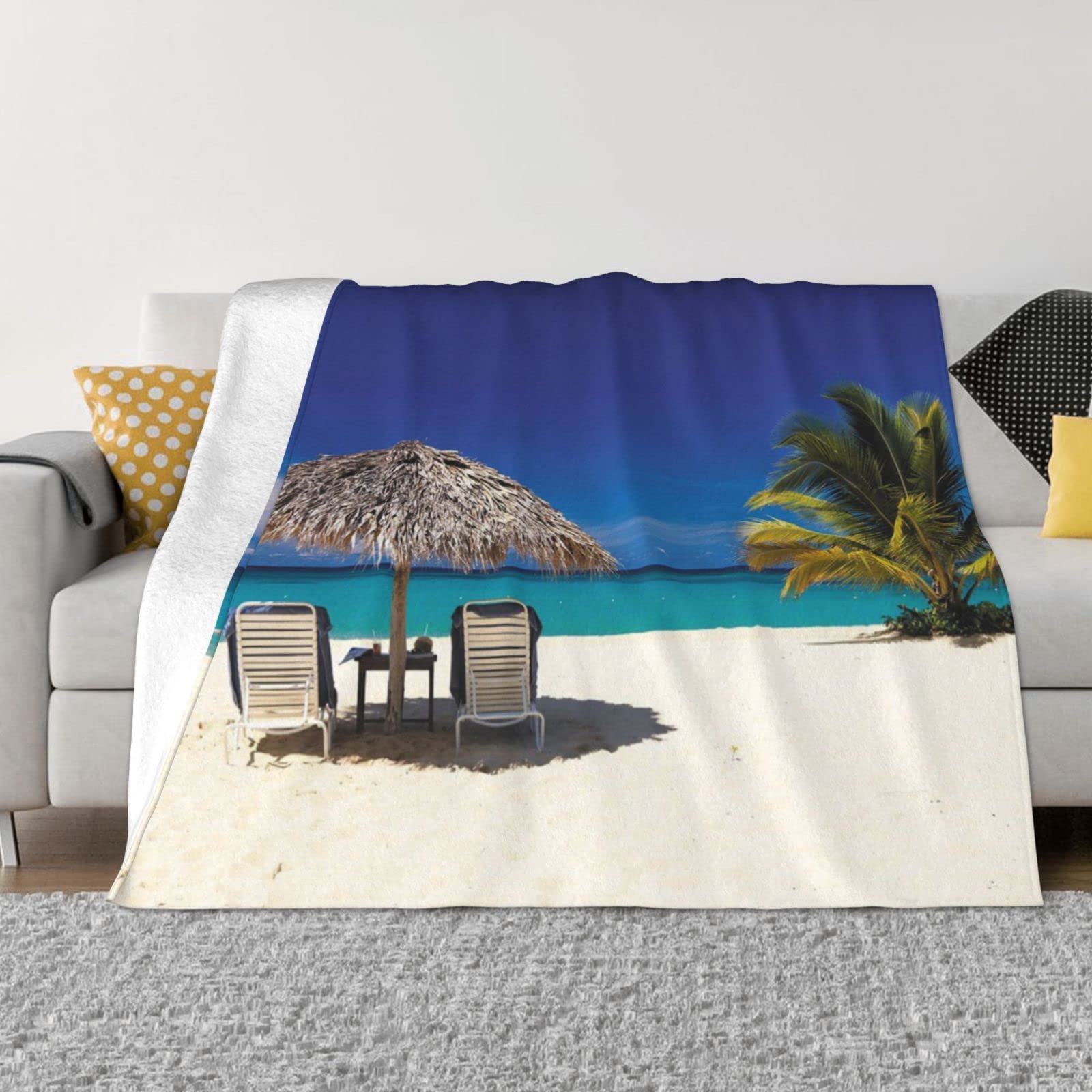 Couverture en flanelle confortable pour cocooning sur le canapé