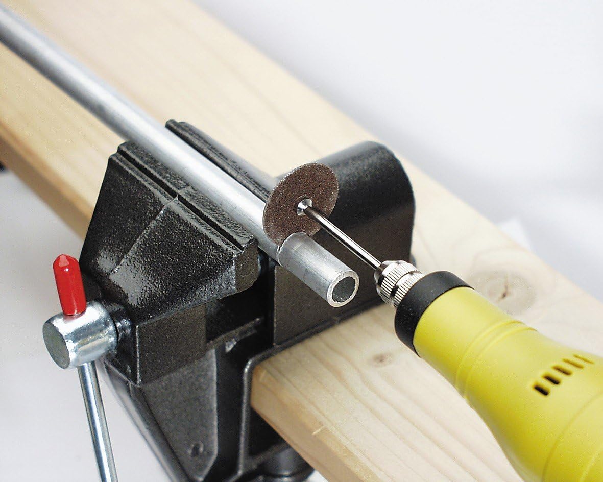 Mini drill cutting a metal tube