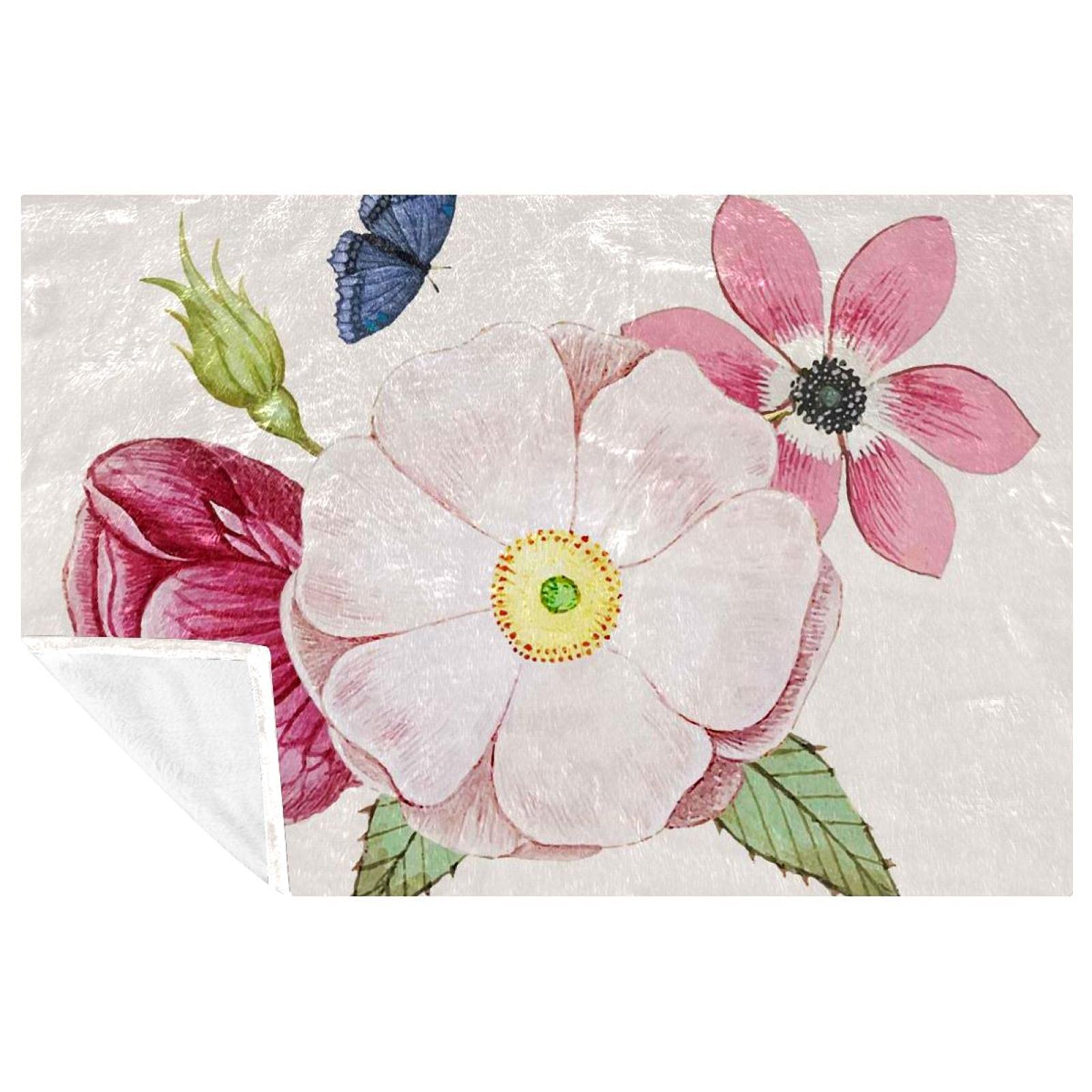 Couverture chaude motif rose sauvage pour ne plus avoir froid sur le canapé