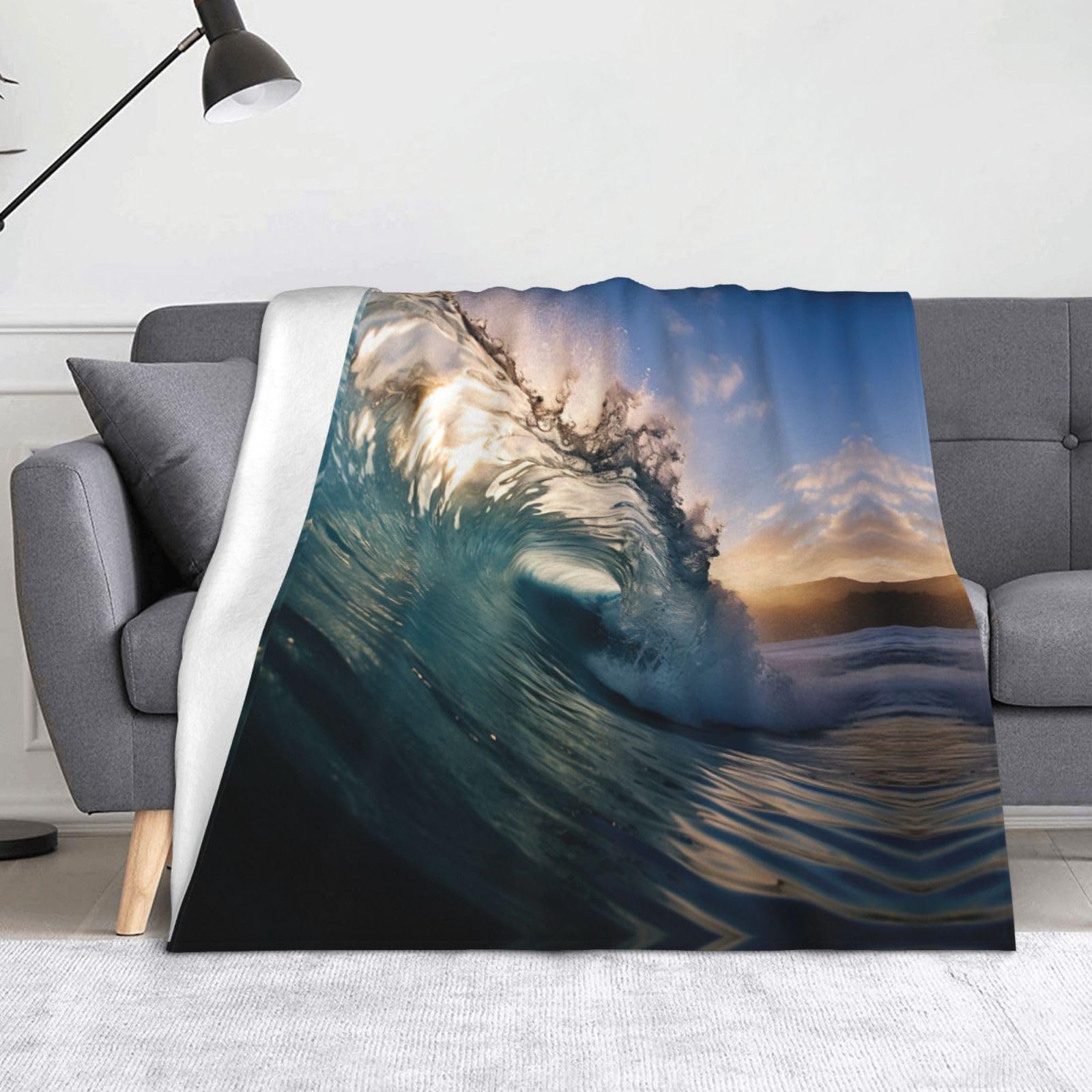 Couverture douce aux motifs vagues de l'océan, le plaid de voyage compact pour vos pique-niques