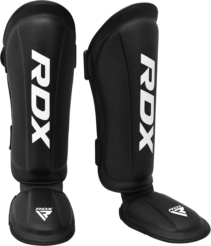 RDX Espinilleras Kickboxing Muay Thai, Aprobado por SATRA SMMAF, Cuero Maya Hide Premium, Almohadillas de protección para el empeine de las piernas, Equipo de Entrenamiento para Patadas y Sparring de Artes Marciales MMA, BJJ Karate Boxeo Taekwondo, Negro