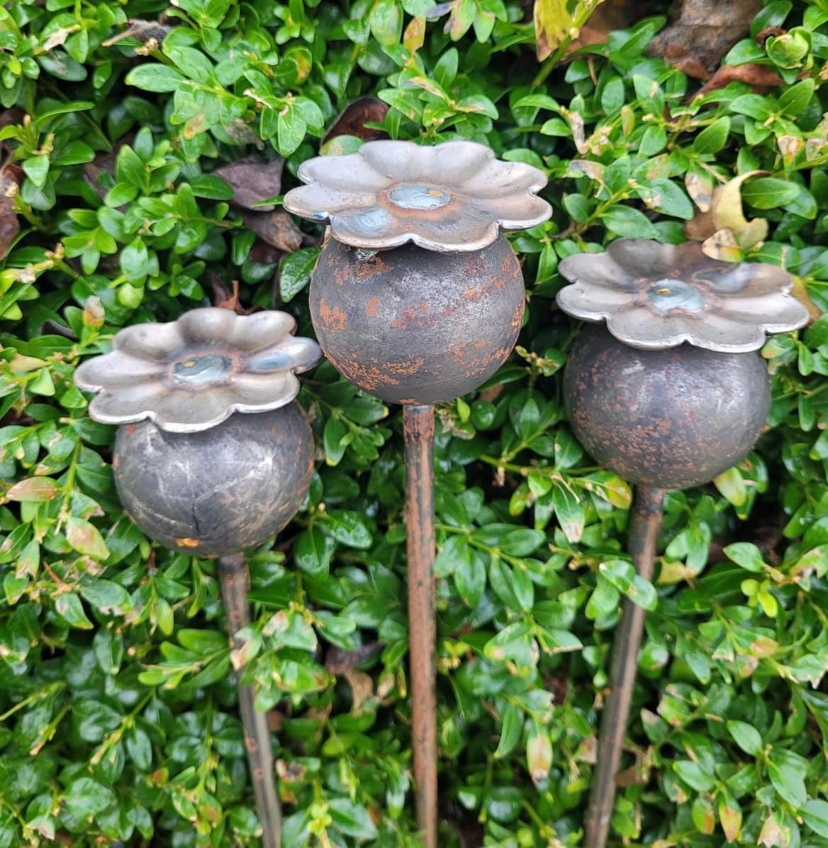 Metal Flower Garden Stakes Designed to rust Sold in packs of 3